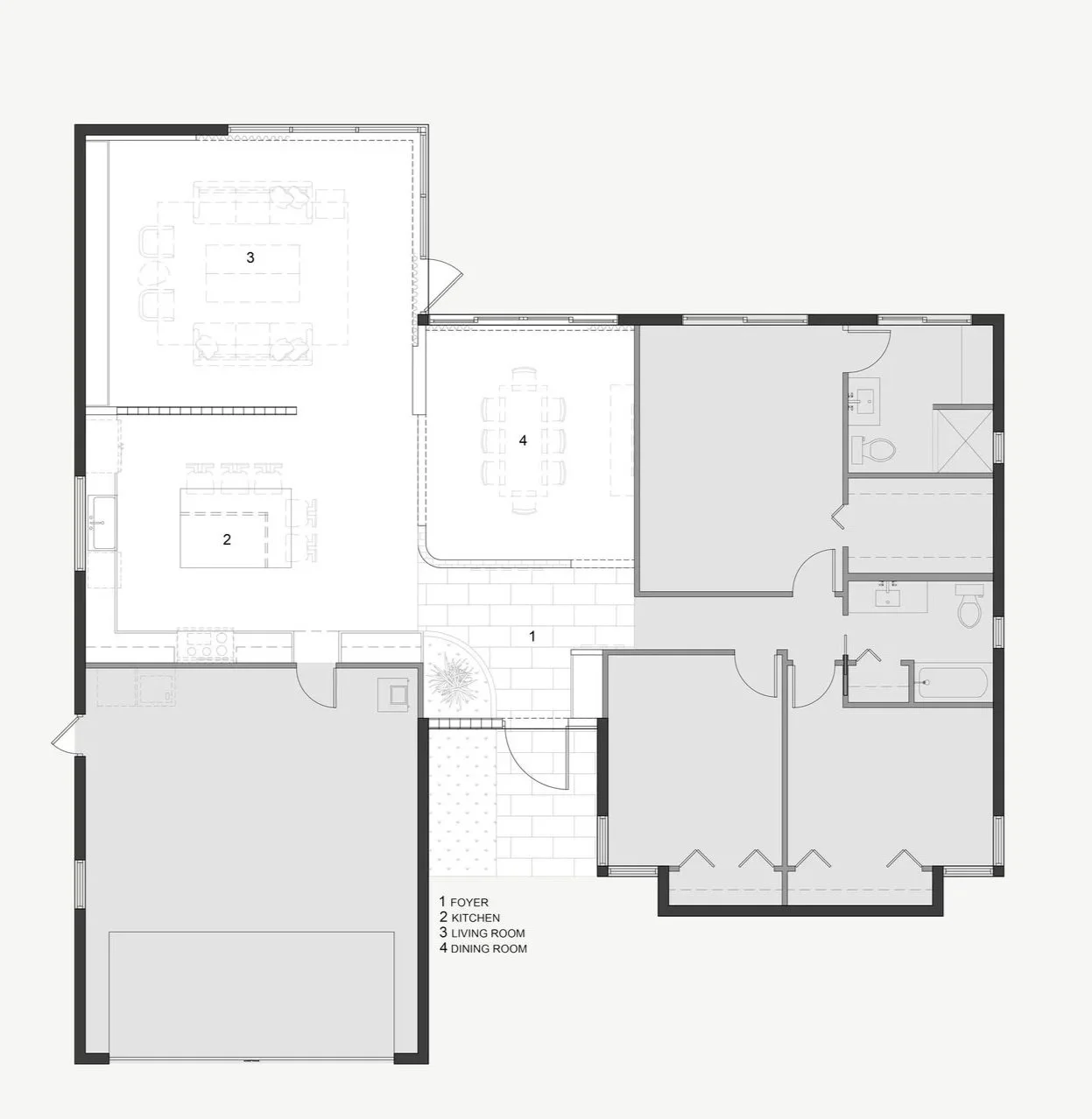 Floor plan of a house showing a foyer, kitchen, living room, dining room, and bedrooms with bathrooms.