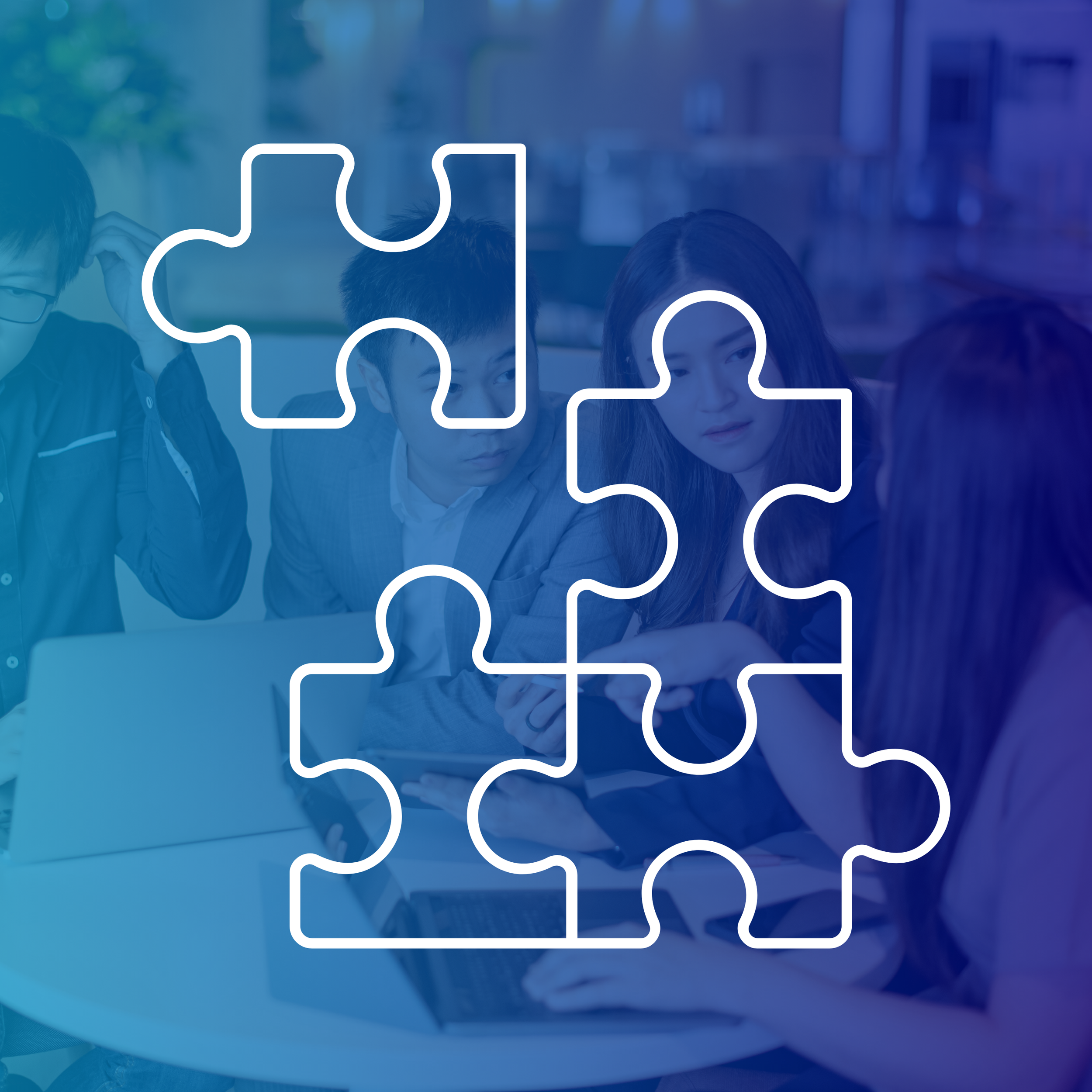 People engaging in a team activity with puzzle piece outline overlay.