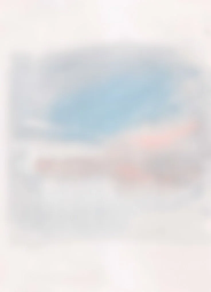 Blurry image with indistinct shapes and colors, difficult to identify specific objects.