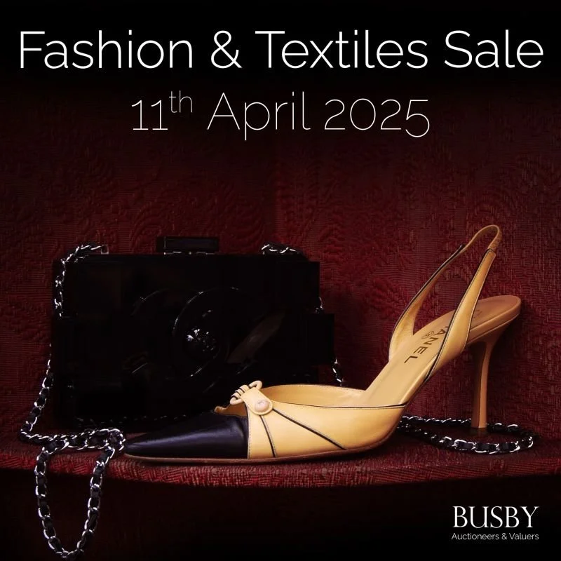 Announcement for a fashion and textiles sale on April 11, 2025, featuring a high-heeled shoe designed to look like a handbag in front of a black purse with a chain strap, on a red textured surface.