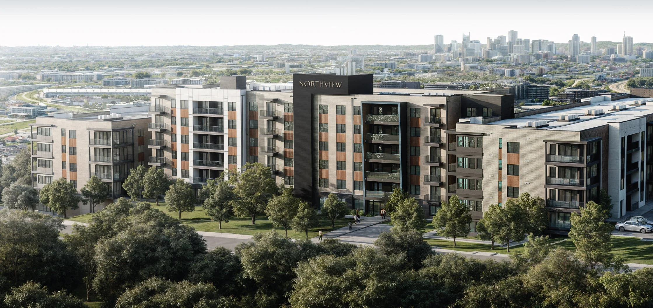 An incredible apartment complex image featuring the prominent Northview sign on the side of the building. It also features the Nashville skyline in the background, establishing it's proximity to downtown Nashville.
