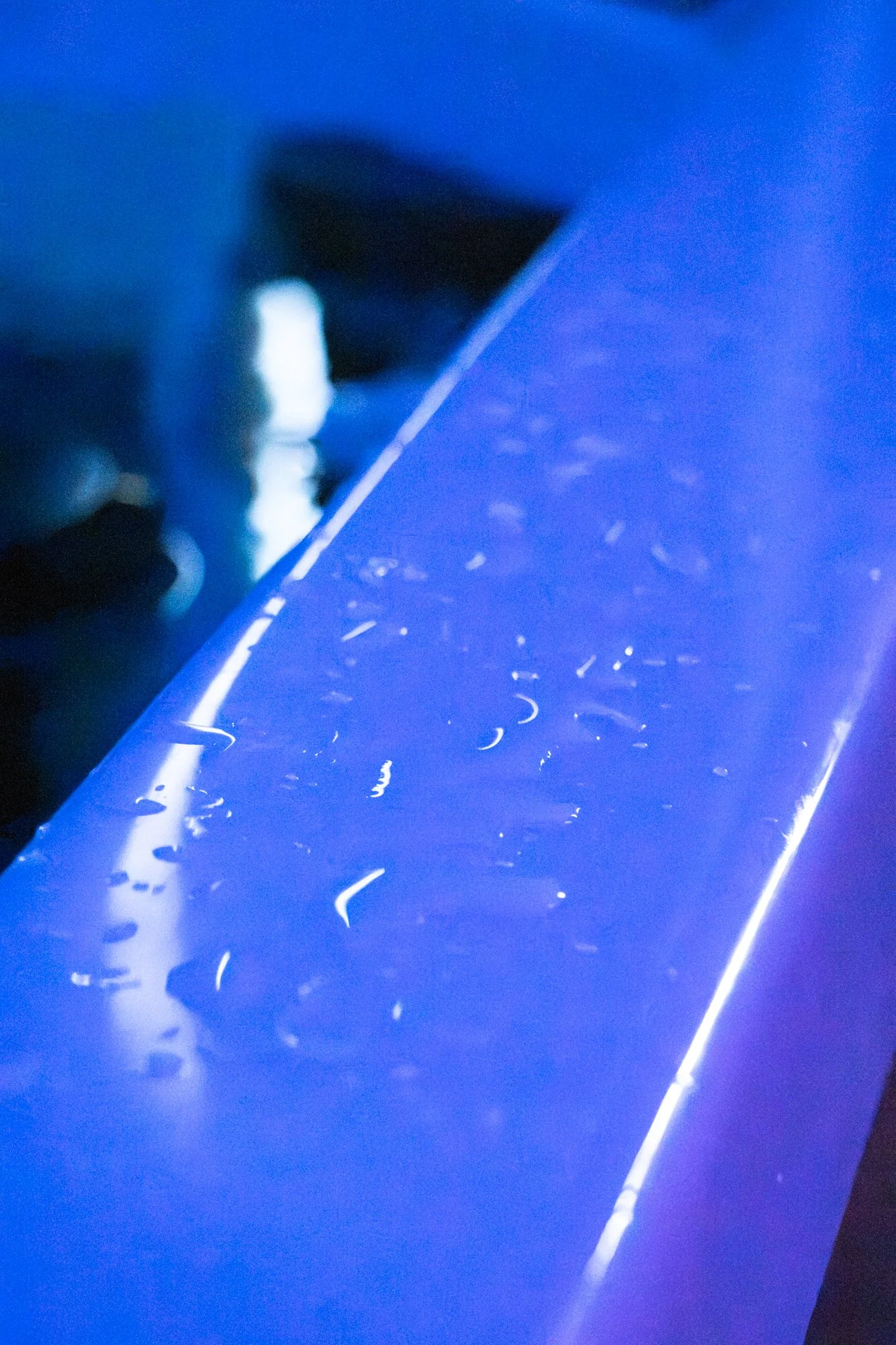 An image of the side of a hot tub, with water drops on it, that was being used for contrast therapy.