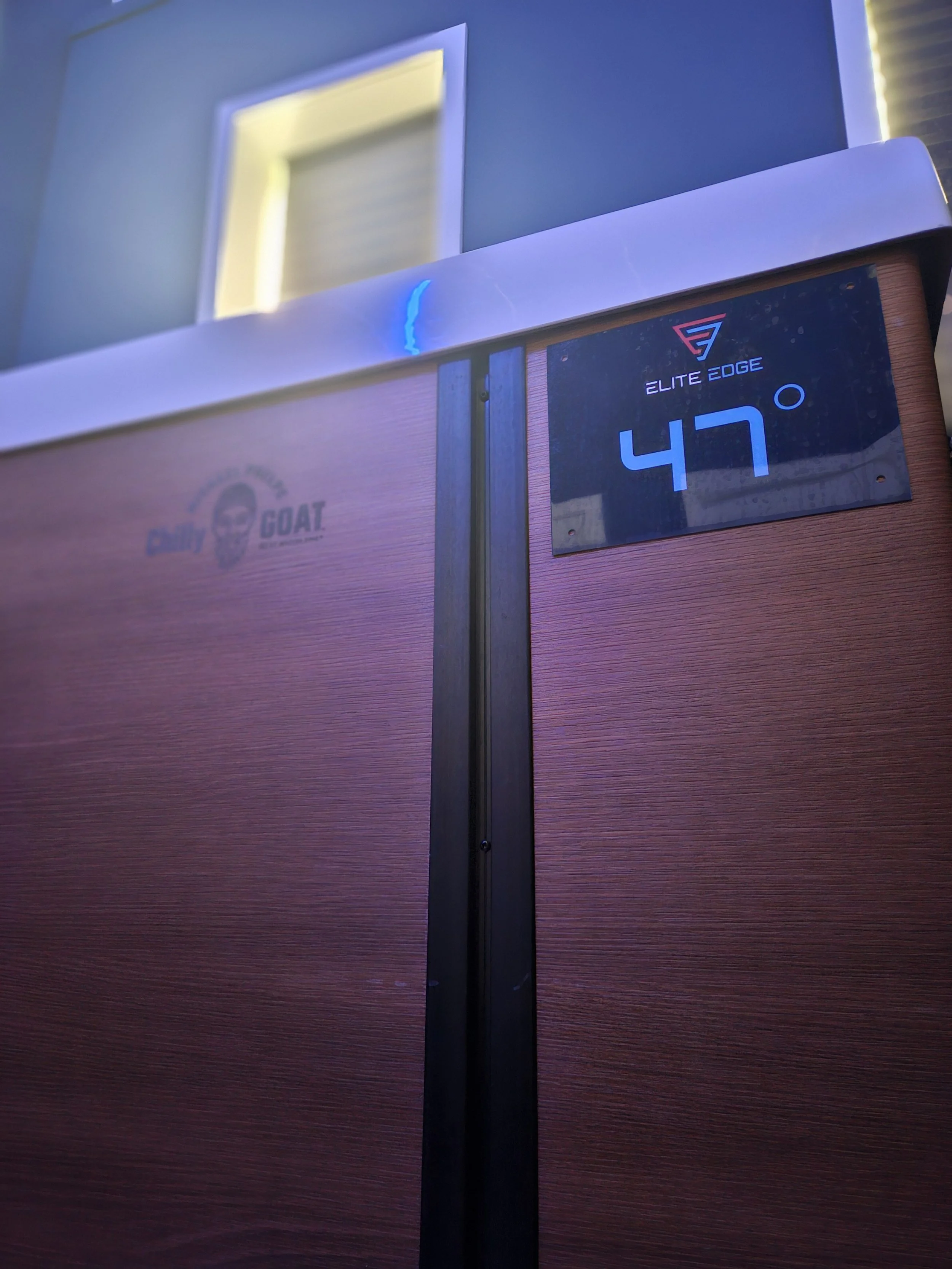 cold plunge with a temperature display showing 47 degrees Fahrenheit.