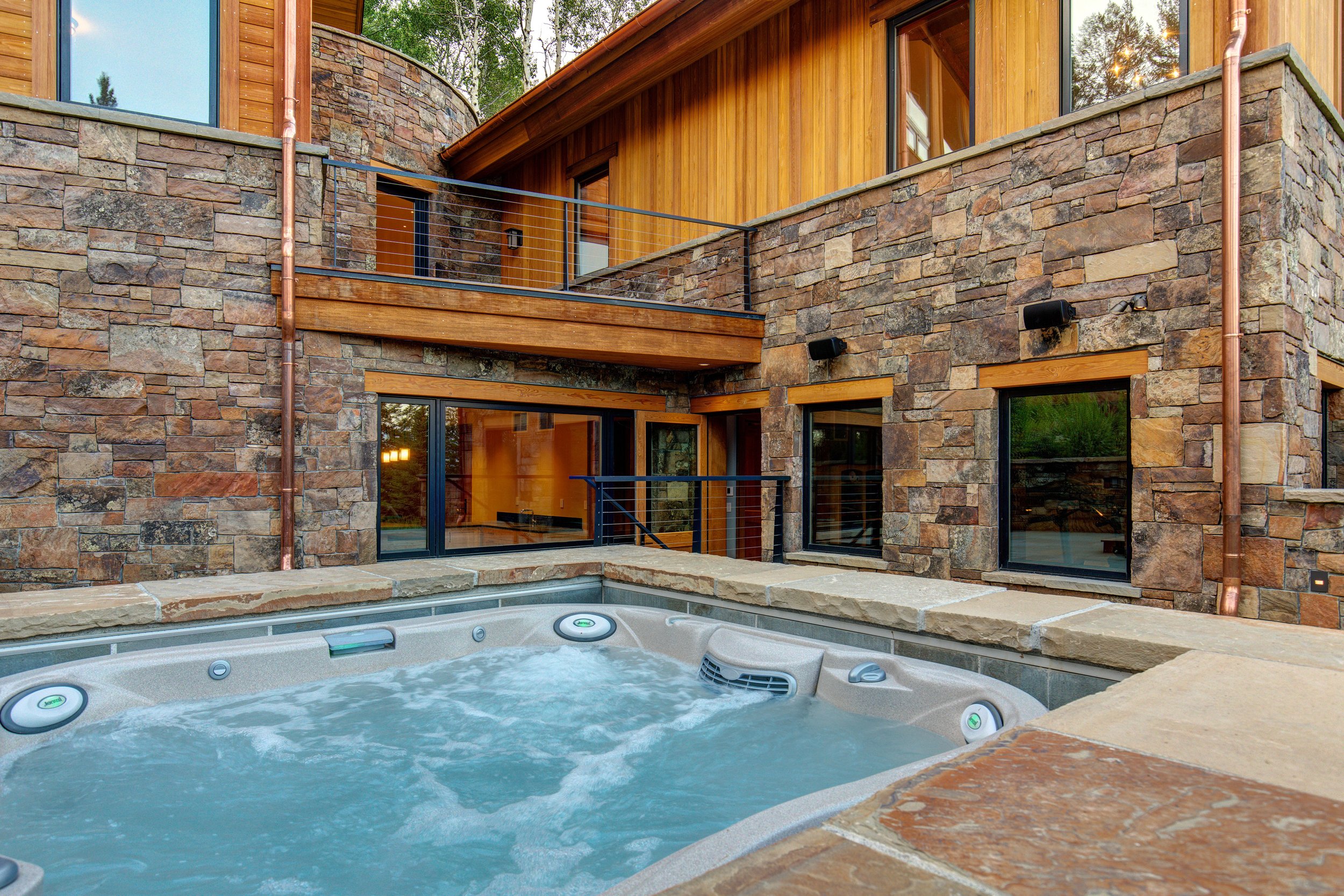 Hot tub with gym in background.jpg