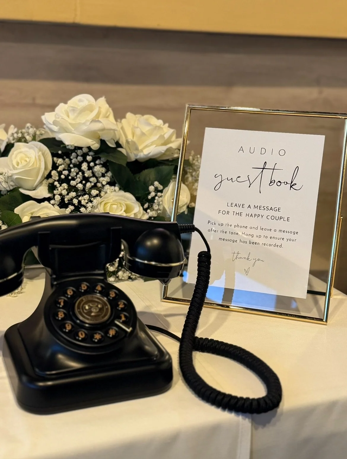 An old-fashioned rotary phone for guests to leave a message for the bride and groom.