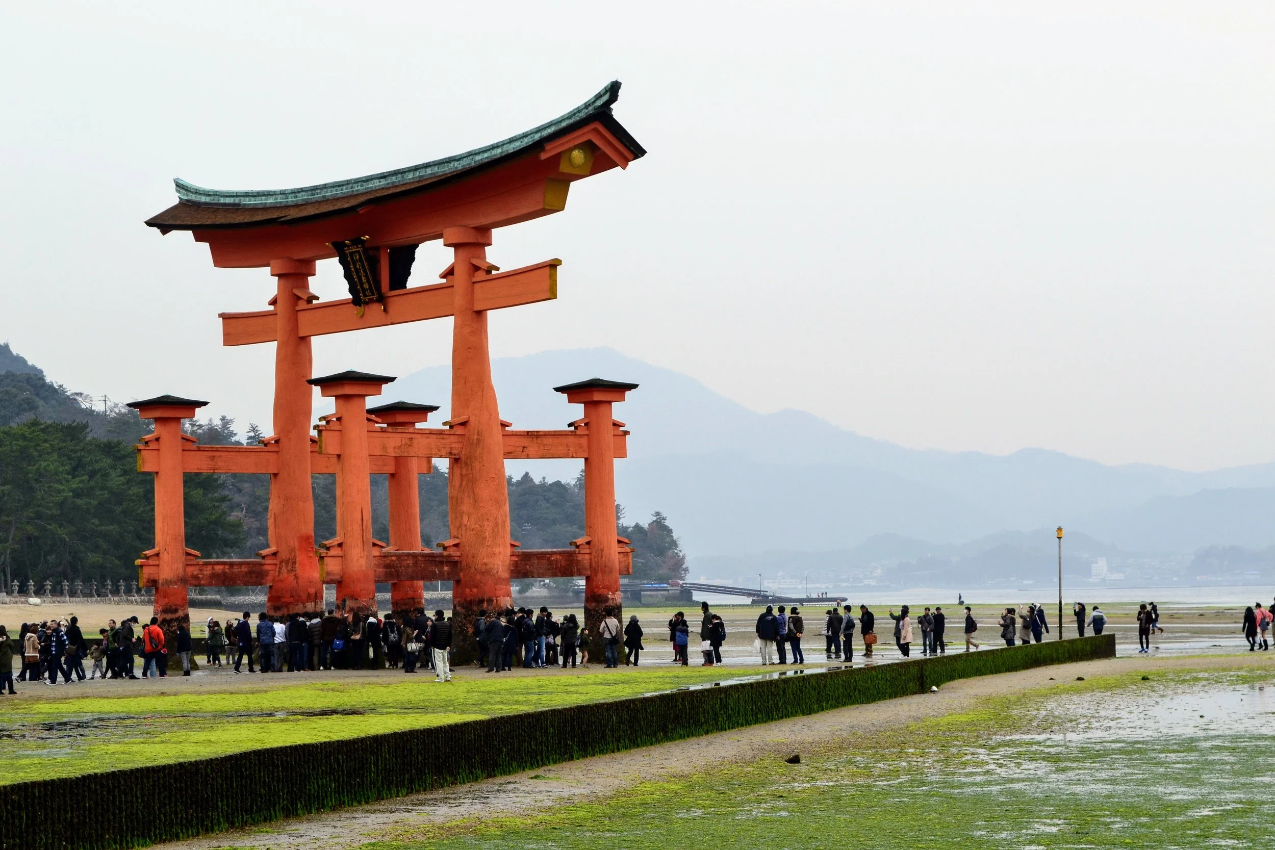 Miyajima (officially Itsukushima) Island, not far from Hiroshima is a cool spot. There are lots of very unafraid deer that wander the island (like Nara, Japan). In high tide, you need a boat to get to this torii gate. 
