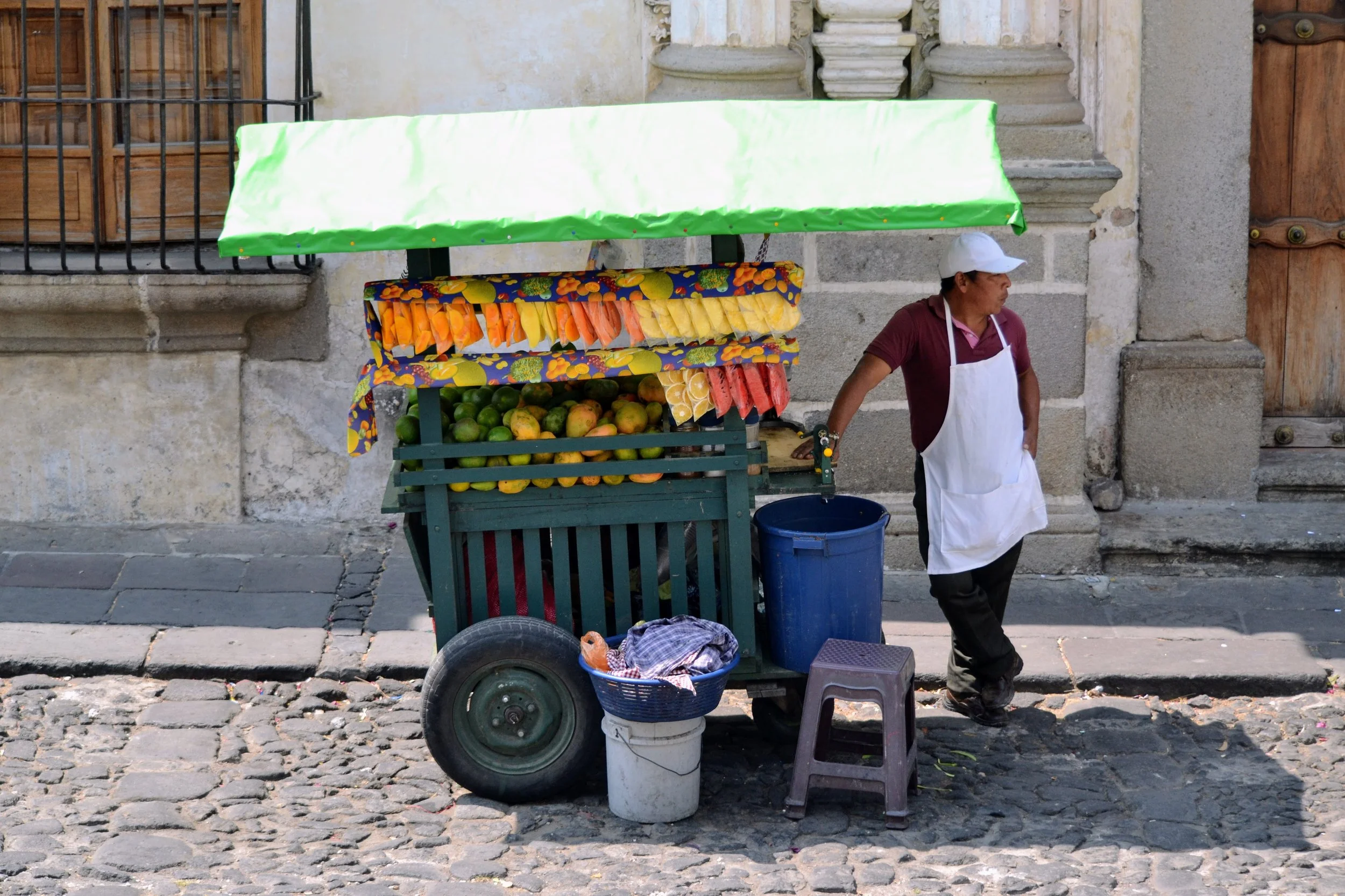 A fruit seller in Antigua, Guatemala. April 2024. 
