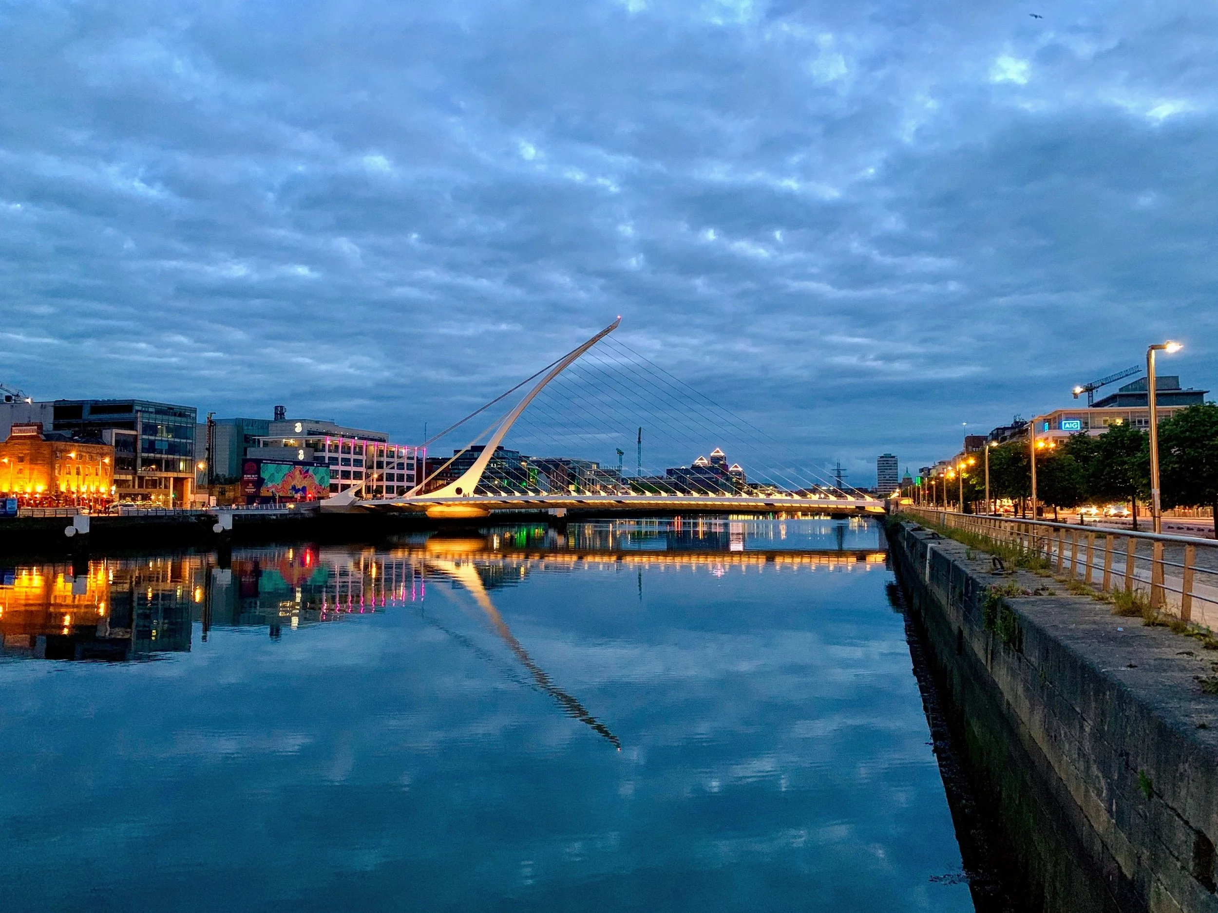 The Samuel Beckett Bridge over the River Liffey  in Dublin, Ireland, not long after a late summer sunset. July 2019.