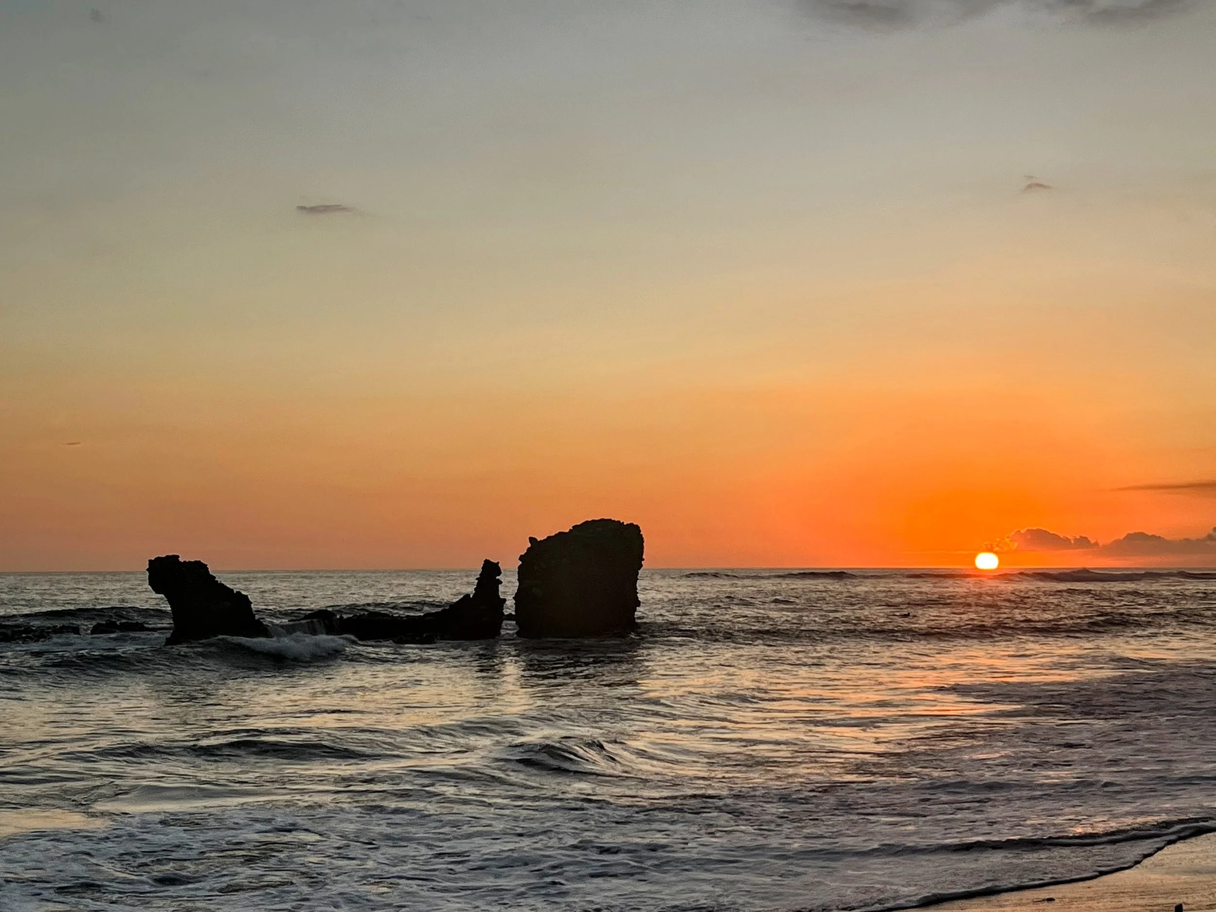 The el tunco ("the pig" in Salvadoran slang) rock in El Tunco, El Salvador. January 2025. 