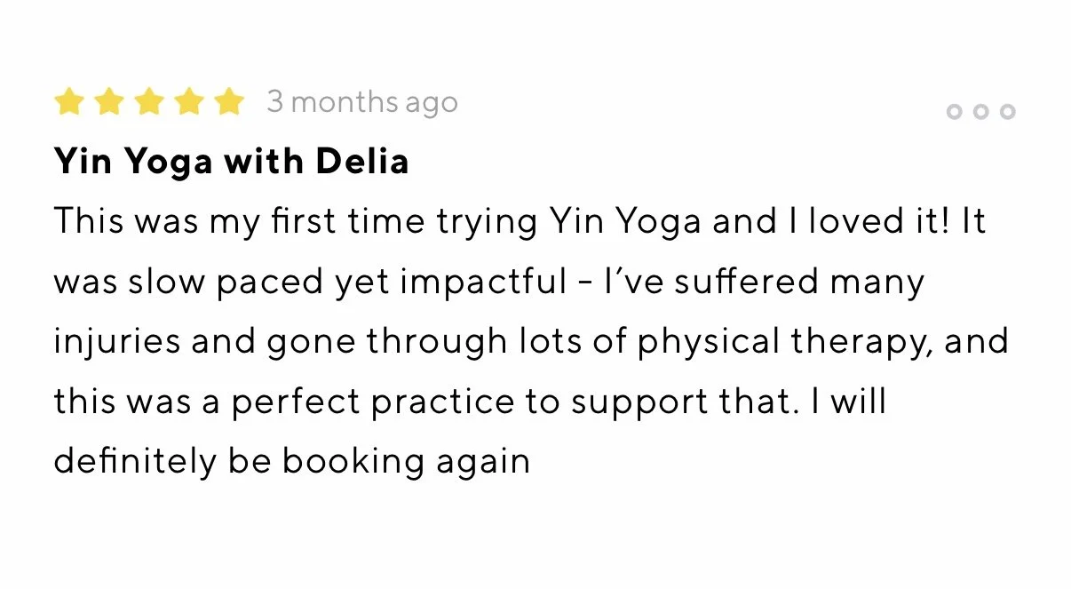 Review of Yin Yoga class by Delia, five-star rating, mentioning it was her first time trying Yin Yoga and finding it beneficial for her injuries, with plans to book again.