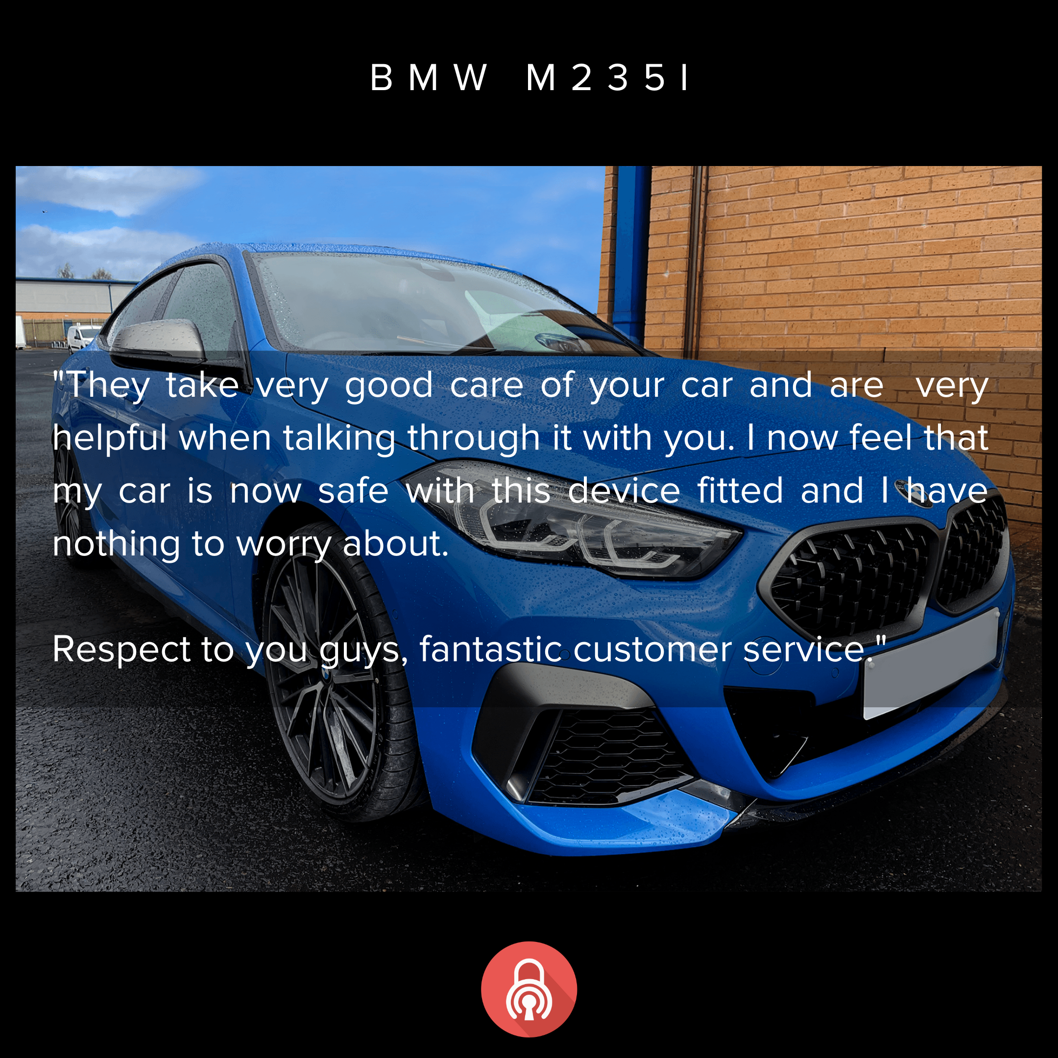 A blue BMW M235i parked outside near a brick wall. The car is wet, indicating it has been recently washed or raining.