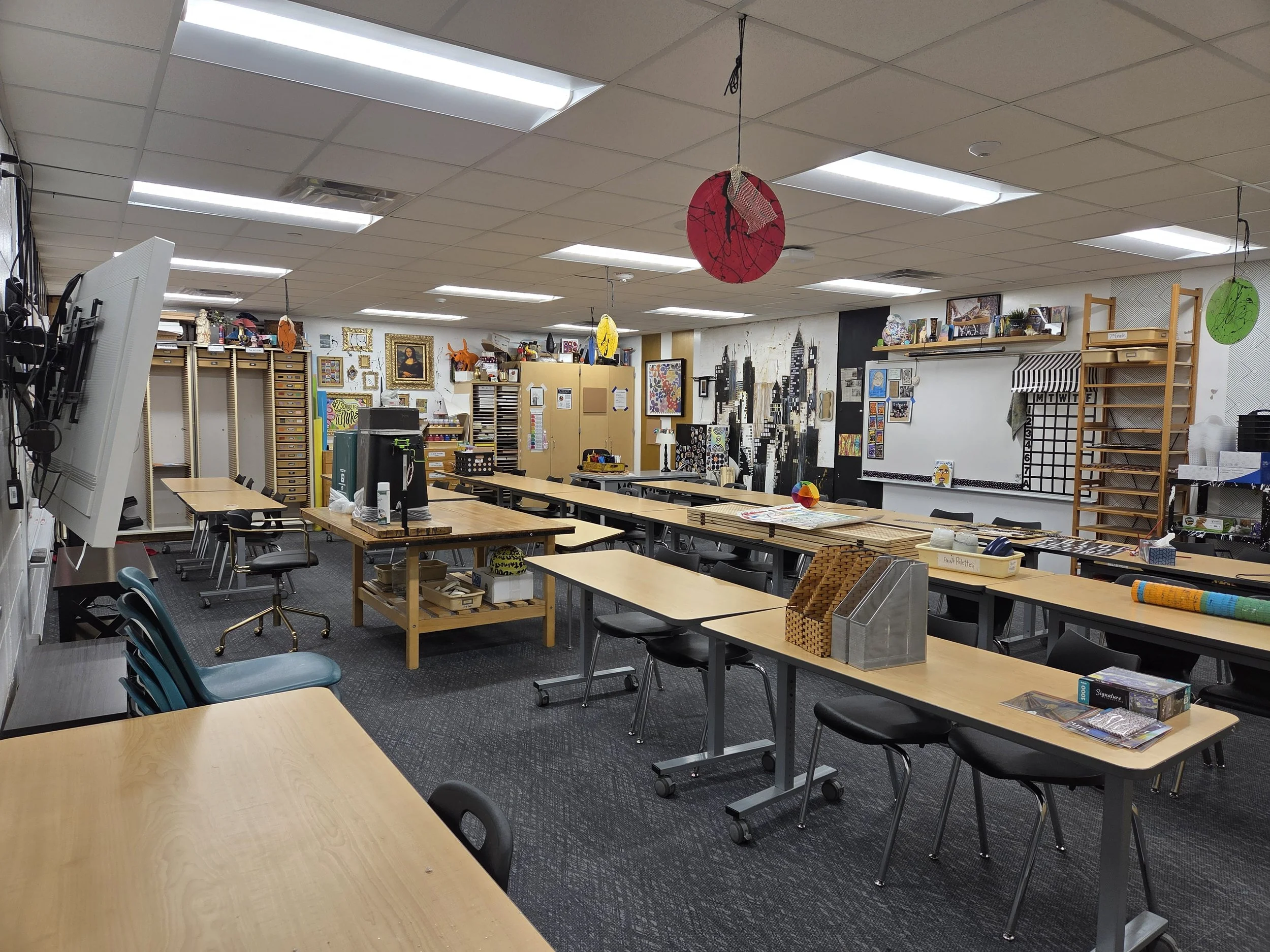 A photo showing outdated fluorescent lighting at Wagner Education Building.
