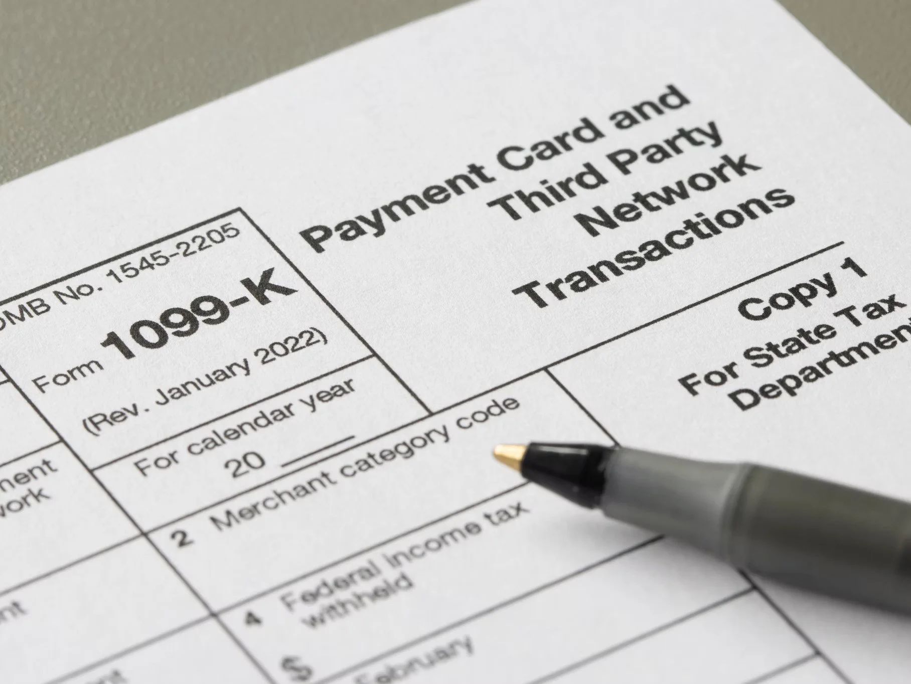 Close-up photo of a 1099-K tax document used for income reporting.