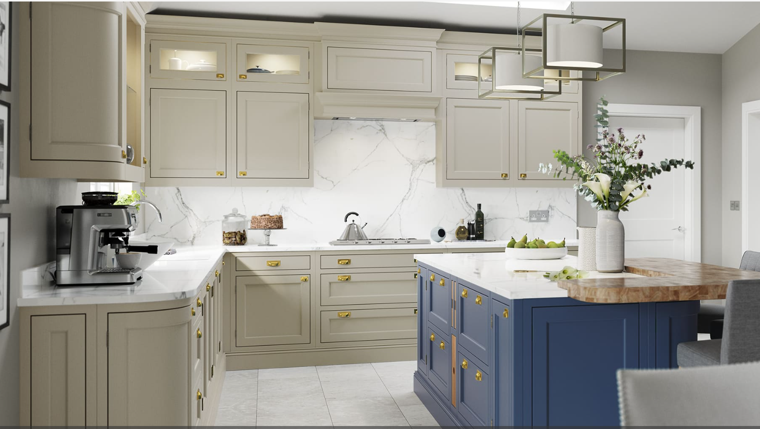 Modern kitchen with beige and blue cabinets, marble backsplash, and a wooden table with a vase of flowers.