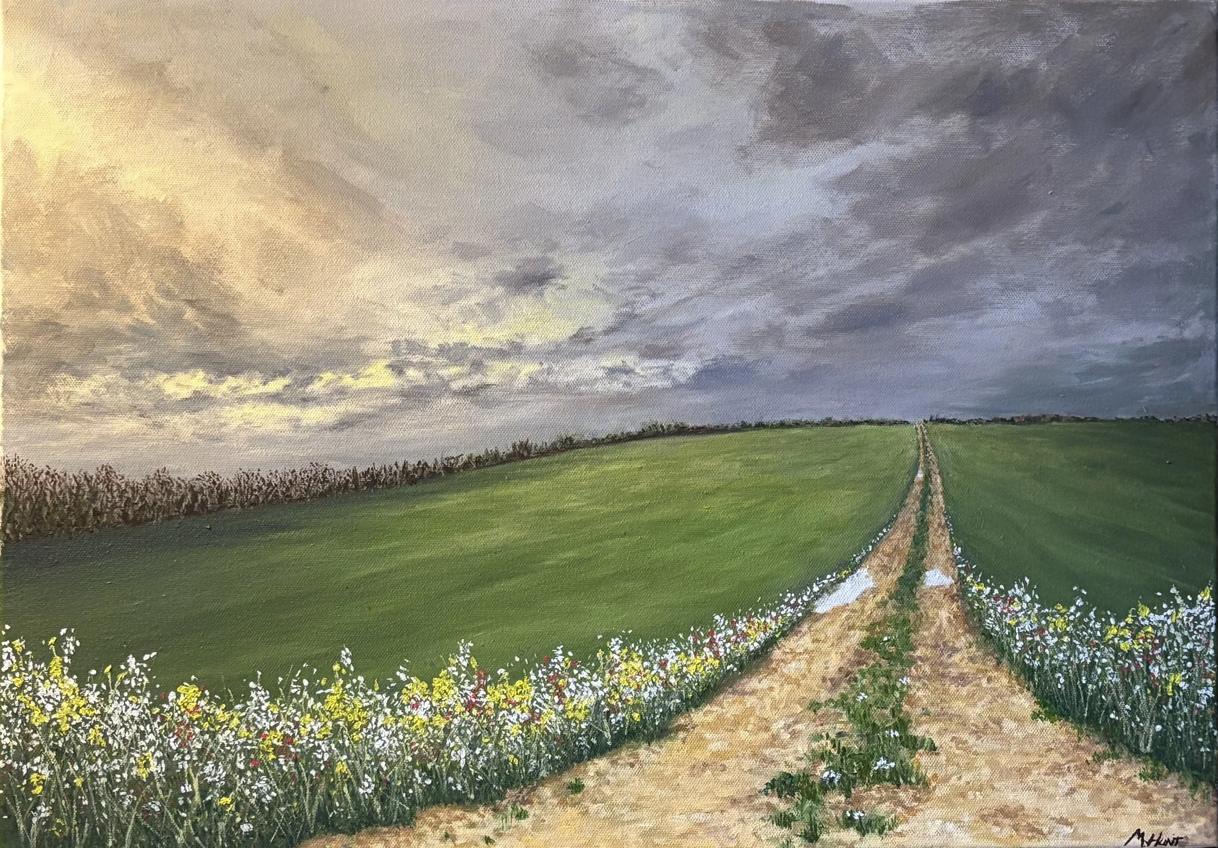 A painting of a rural landscape showing a dirt path through green fields, with a cloudy sky overhead and a row of bushes along the horizon.