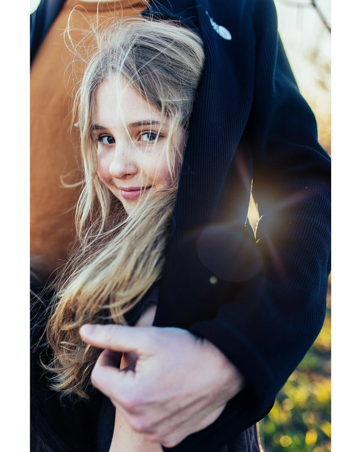 I see a girl.

She is safe. Content. Calm&mdash;with a sparkle in her eyes. A quiet excitement. She&rsquo;s ready to play, to explore the world. She is grounded and free all at once.

Why?

Because there is a hand. A calm, strong, supportive hand. Re