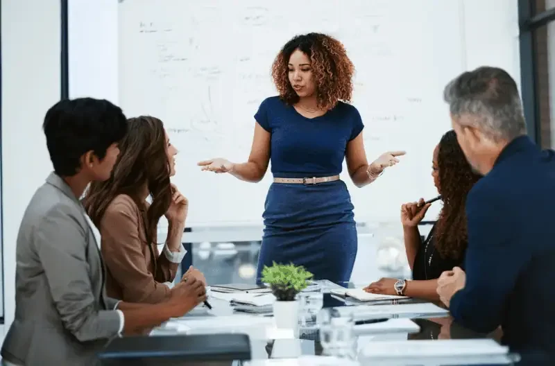 Woman speaking during a workplace meeting