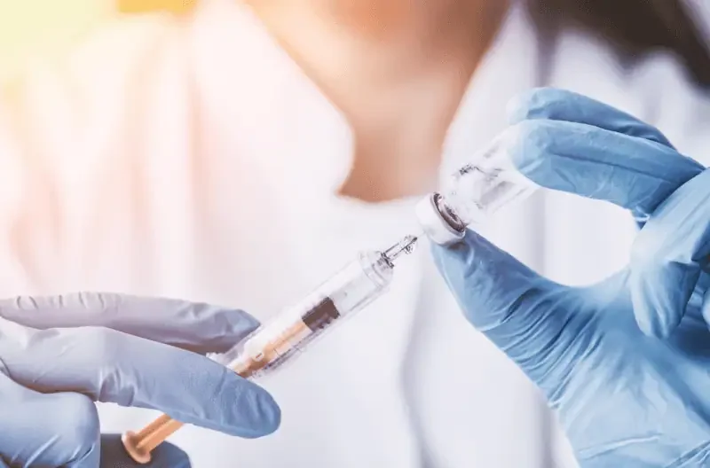 Close-up of an injection syringe filled with medicine