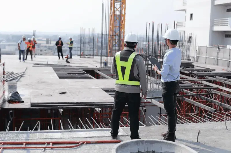 People working at an active construction site.
