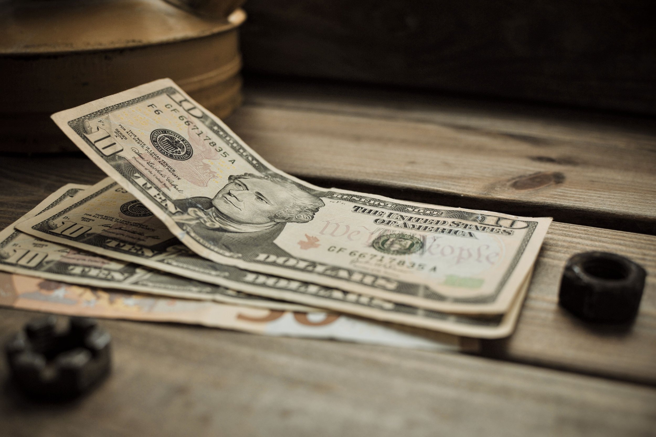 Cash resting on a tabletop