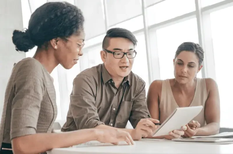 Employees collaborating on a project.