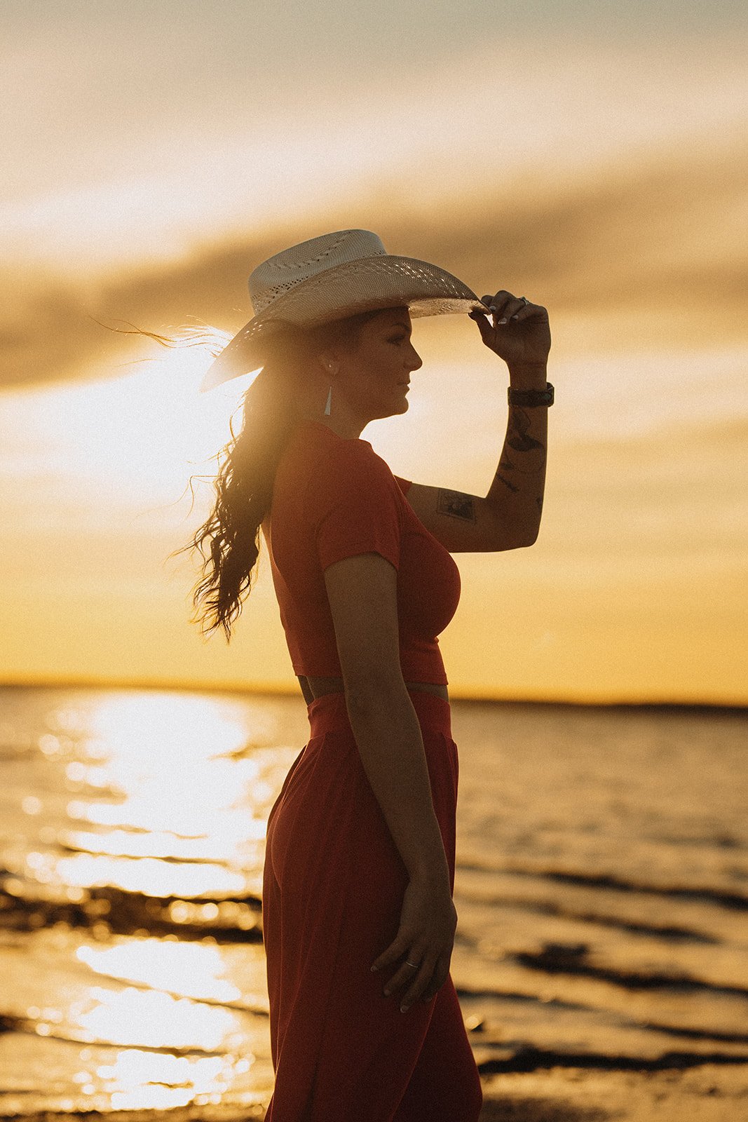 Creative photoshoot at a Mississippi lake at sunset.