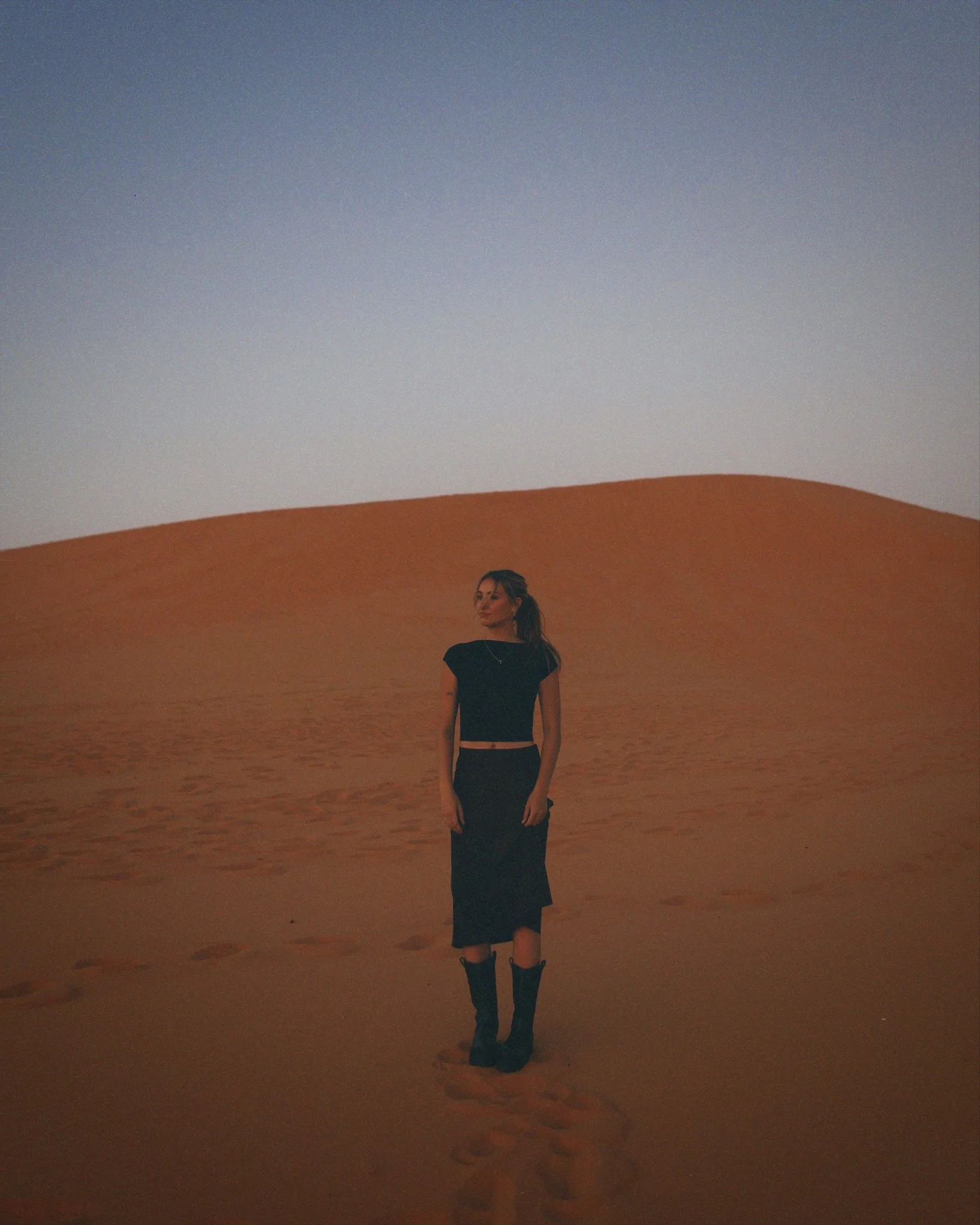 Blue hour styled photoshoot in the Utah sand dunes.
