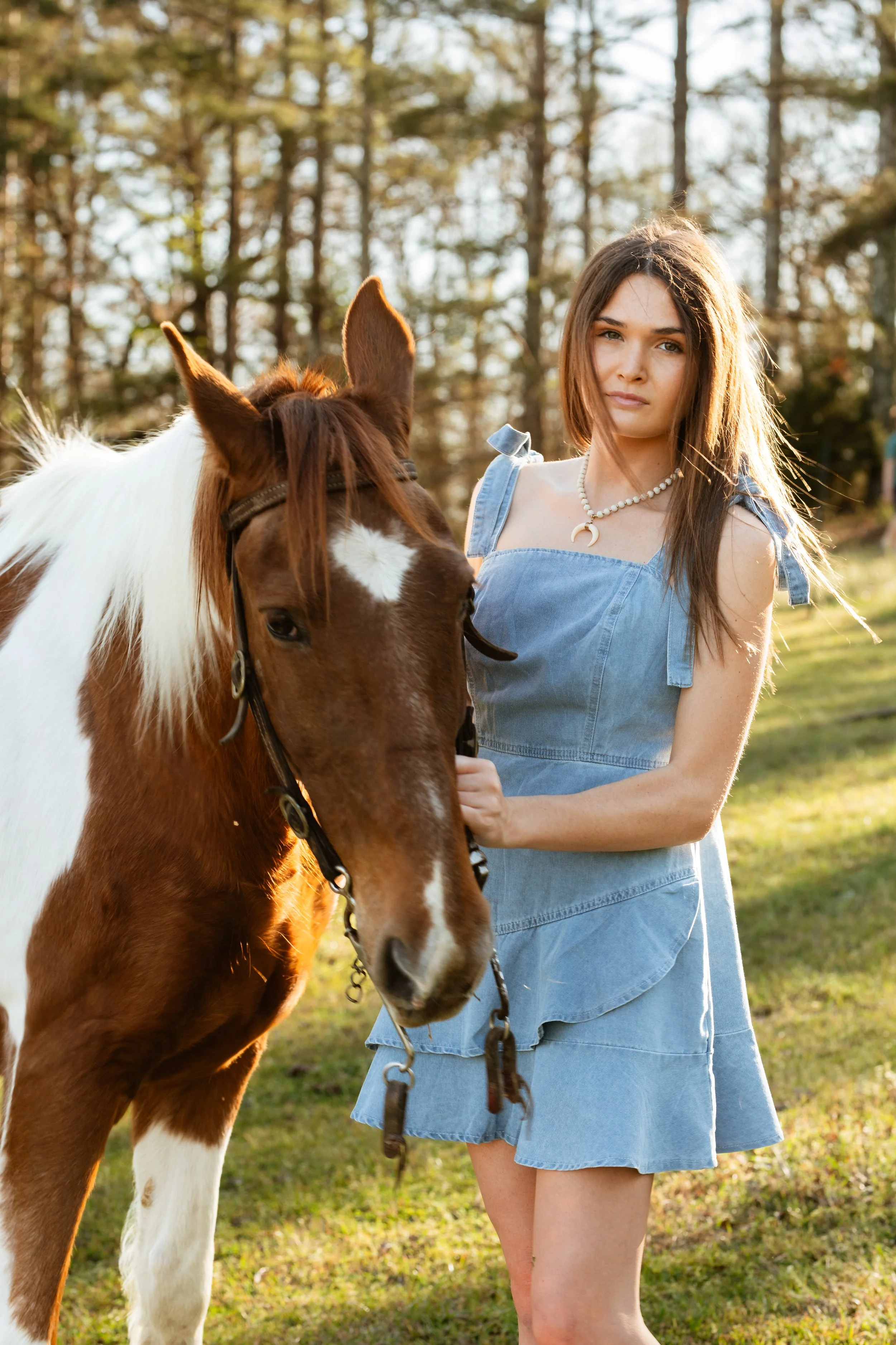 High school senior photos with a horse.