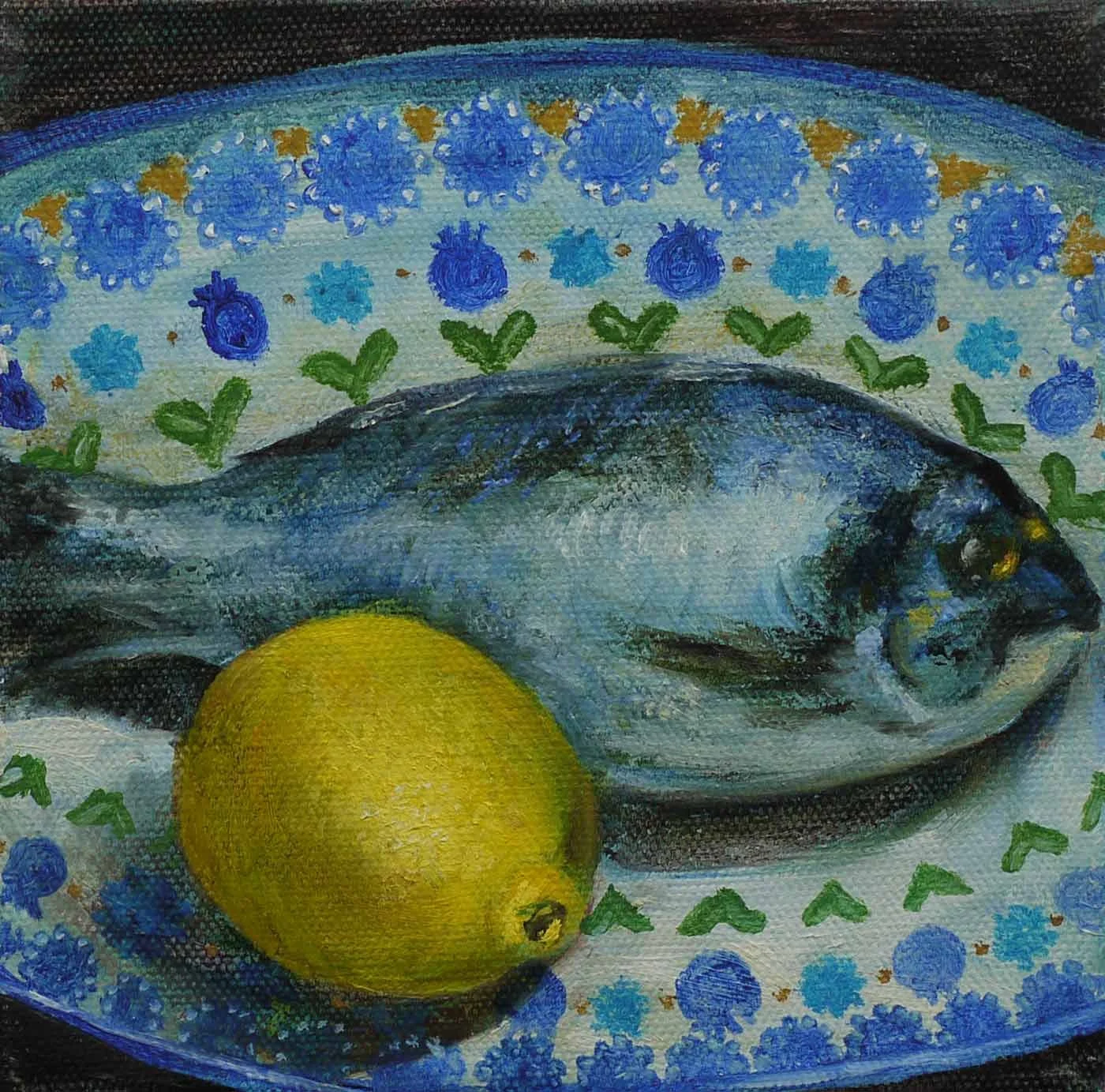 A painting of a fish on a decorative plate with blue and yellow floral patterns, accompanied by a lemon.