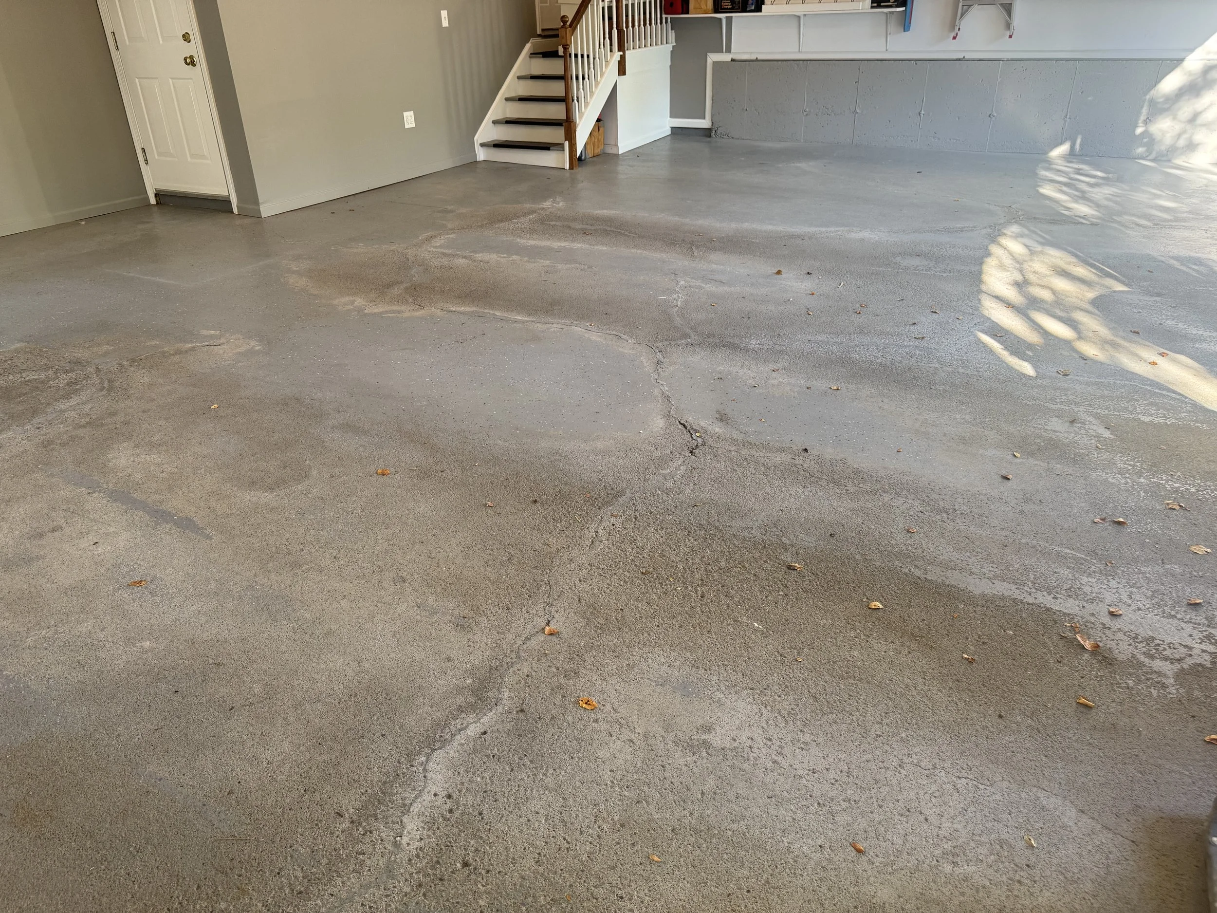 Cracked garage floor before epoxy system