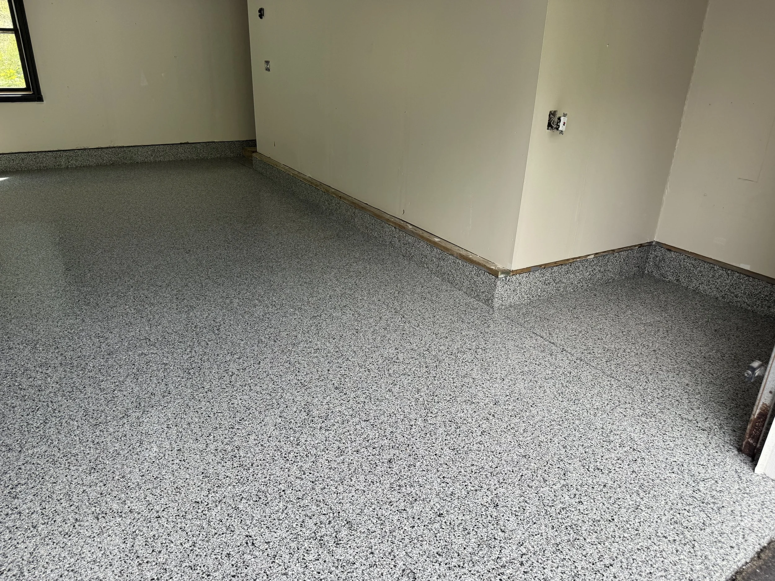 1st photo of keystone flake. This garage opted in for stem walls to be flaked.