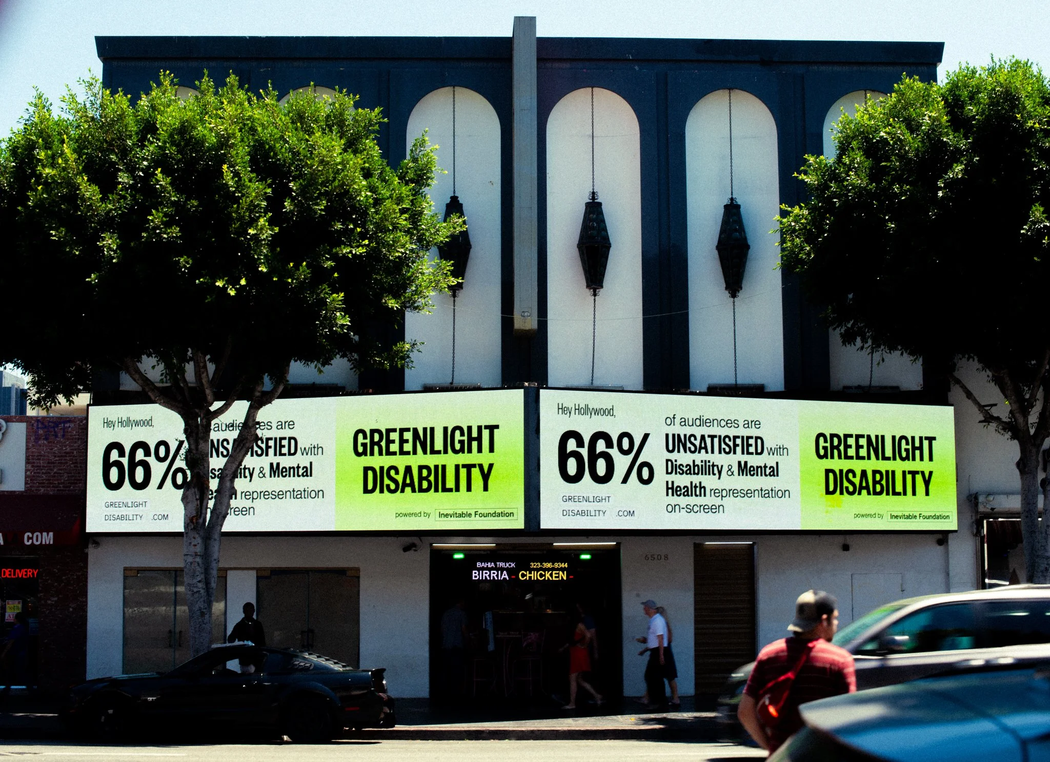 A photo of a billboard that says, "66% of audiences are unsatisfied with disability & mental health representation on-screen. Greenlight disability."