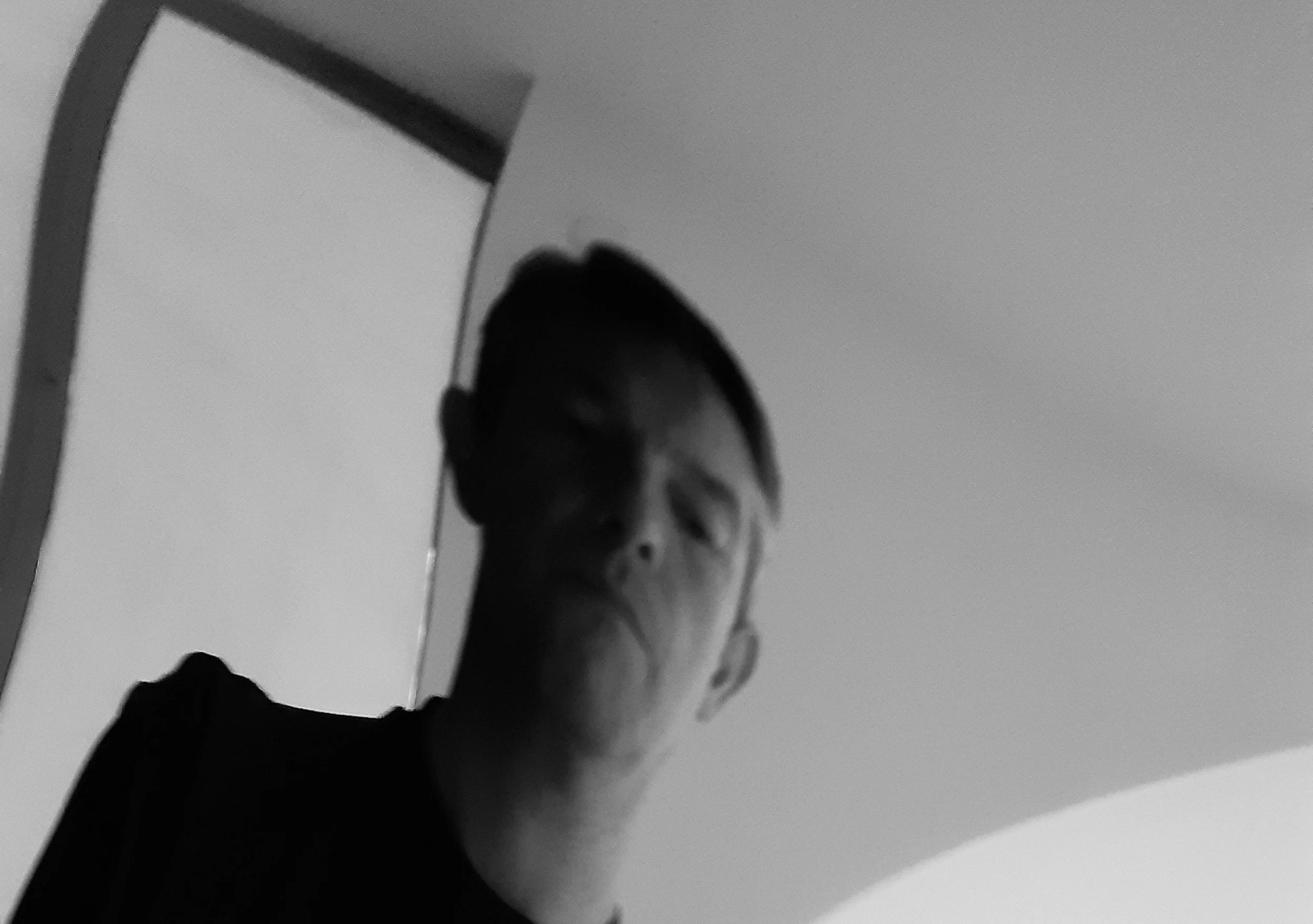 a black and white photograph of David Frankel.