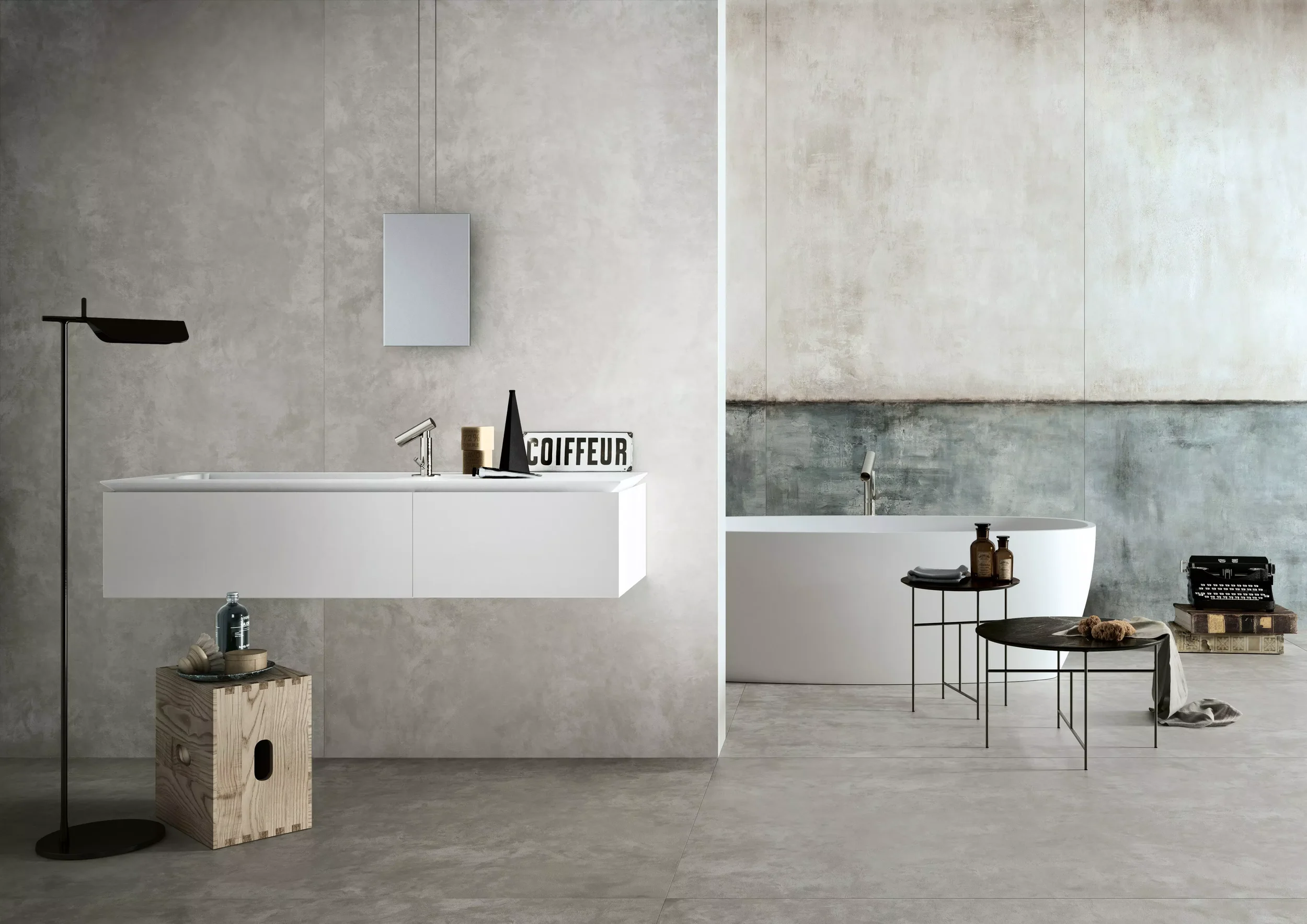 Luxury bathroom featuring Florim Cedit Storie porcelain stoneware tiles on walls and floors, showcasing a weathered, textured aesthetic reminiscent of faded frescoes, supplied and installed nationwide by PietraCasa.