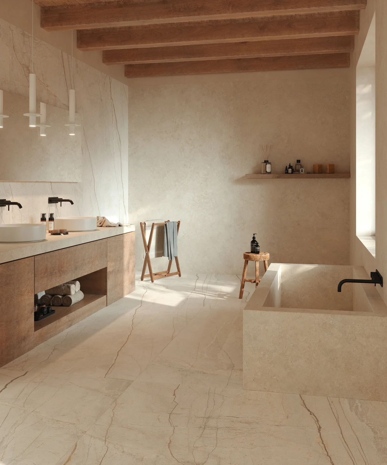 Serene spa bathroom featuring Marazzi Grande Stone Look porcelain slabs in Limestone Ivory Satin, paired with warm wood-look accents and timber ceiling beams, available through PietraCasa.