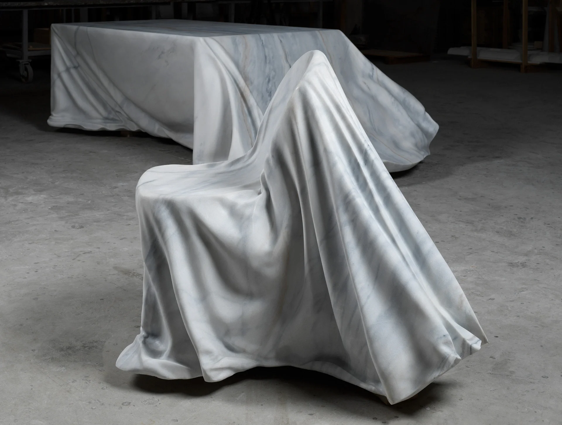 The Velata Chair and Table from the striking Velata Collection by Margraf, designed by Raffaello Galiotto, supplied by PietraCasa.