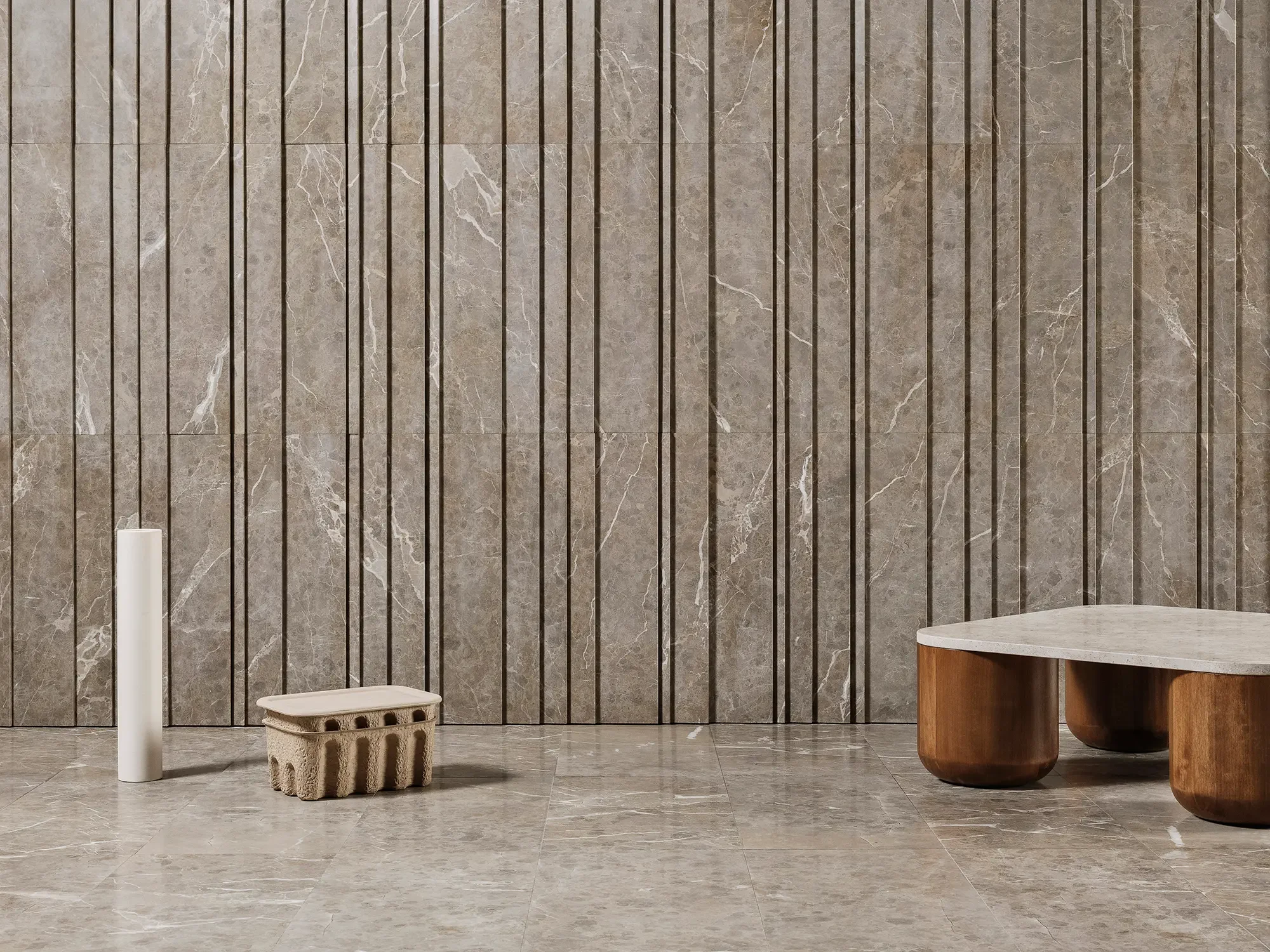 Sophisticated interior featuring Luce di Carrara marble wall surfaces and designer furniture, supplied by PietraCasa.