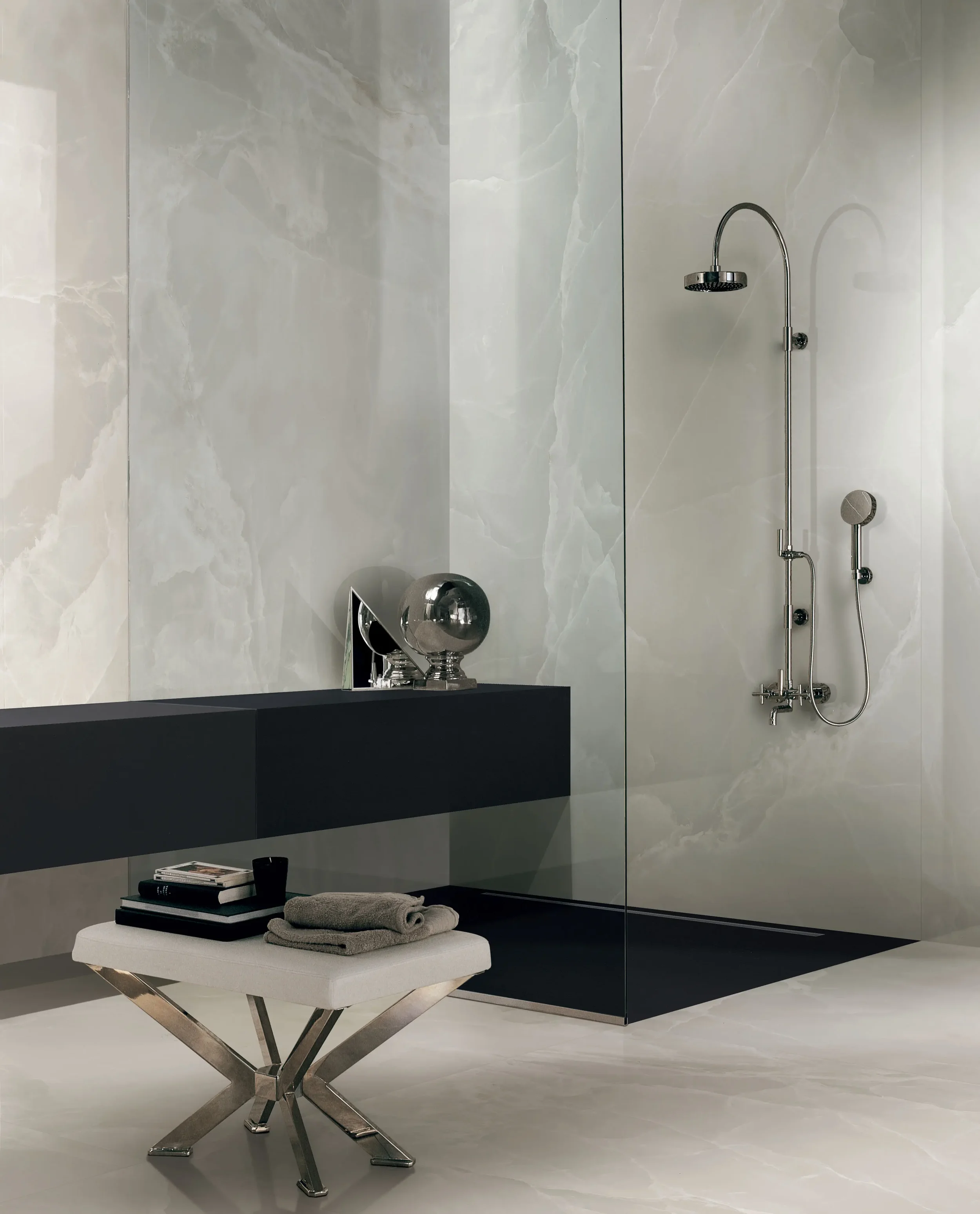 Luxurious bathroom featuring Florim Eccentric Luxe Cloudy White tiles with a glossy finish and a sophisticated onyx effect, expertly supplied and installed by PietraCasa.