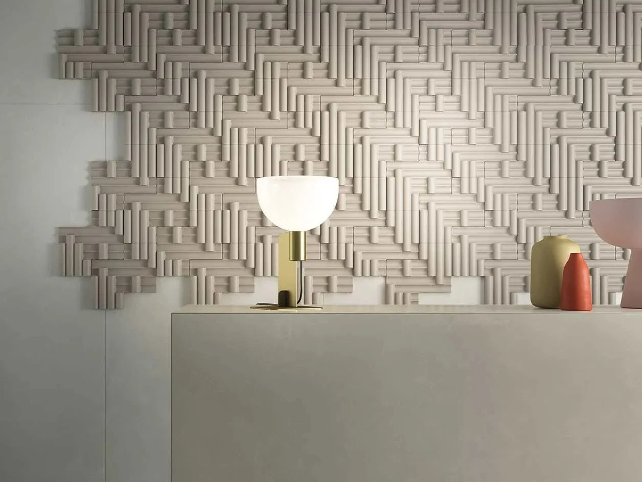 Architectural detail featuring Rilievi porcelain stoneware tiles by CEDIT, featuring a distinct 3D, geometric texture designed by Studio Zaven, supplied and installed nationwide by PietraCasa.