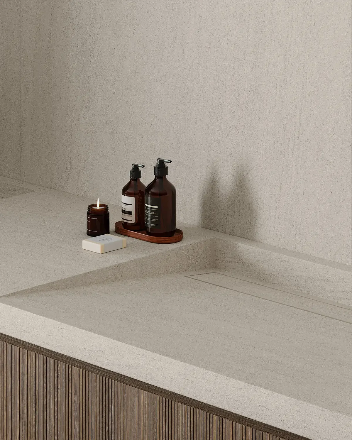Modern minimalist bathroom vanity featuring an integrated sink and countertop crafted from INALCO Atalaia Super Blanco sintered compact surface, styled with Aēsop accessories.