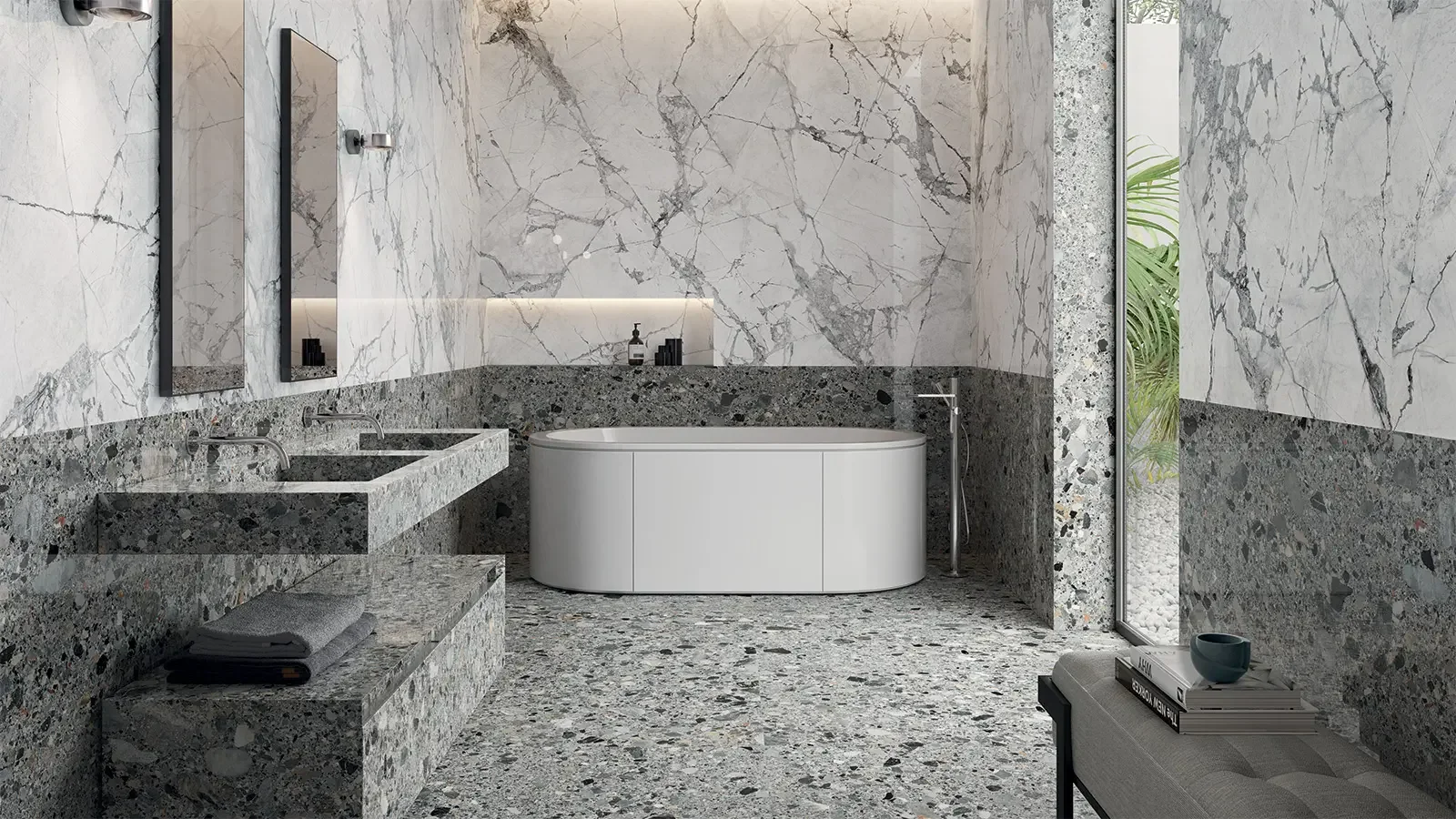 Luxury modern bathroom interior featuring the Italgraniti 'Charm Experience' collection, pairing white marble-effect and Ceppo Artistico terrazzo-effect porcelain slabs, available through PietraCasa.