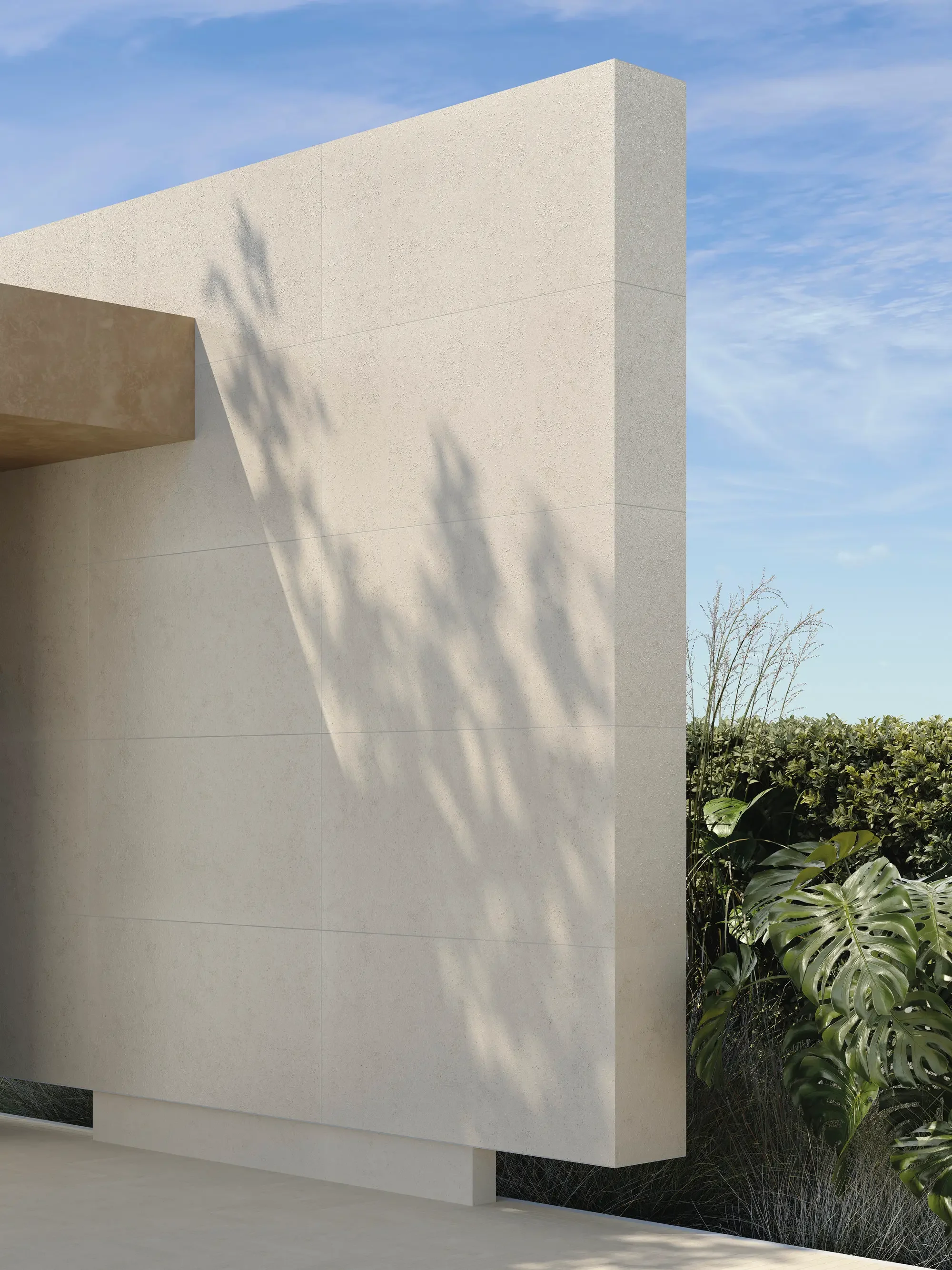 Modern architectural facade featuring premium Italian porcelain stoneware from the FMG TerraPura Pura Bianco collection, expertly supplied and installed by PietraCasa for indoor and outdoor applications.
