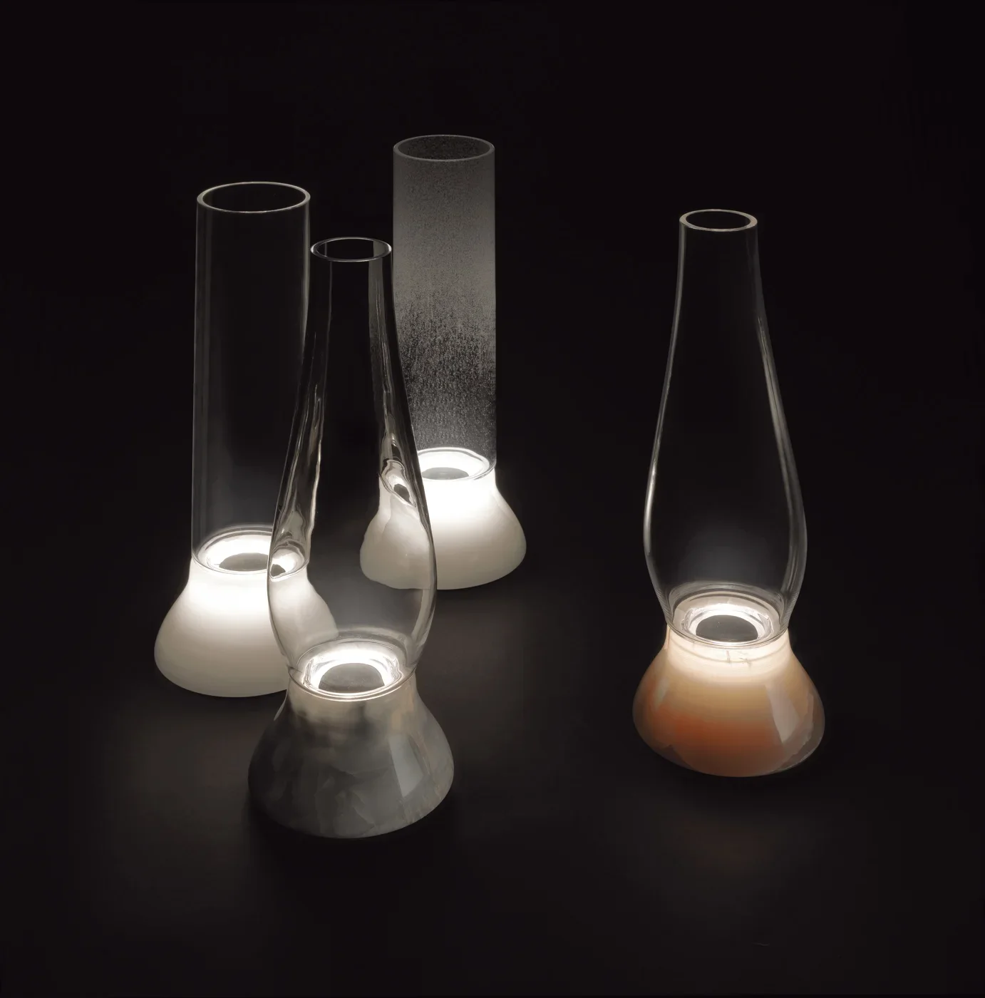 Meta-Miro table lamps designed by Enzo Berti for Kreoo, showcasing the elegant fusion of natural stone and light, supplied by PietraCasa.