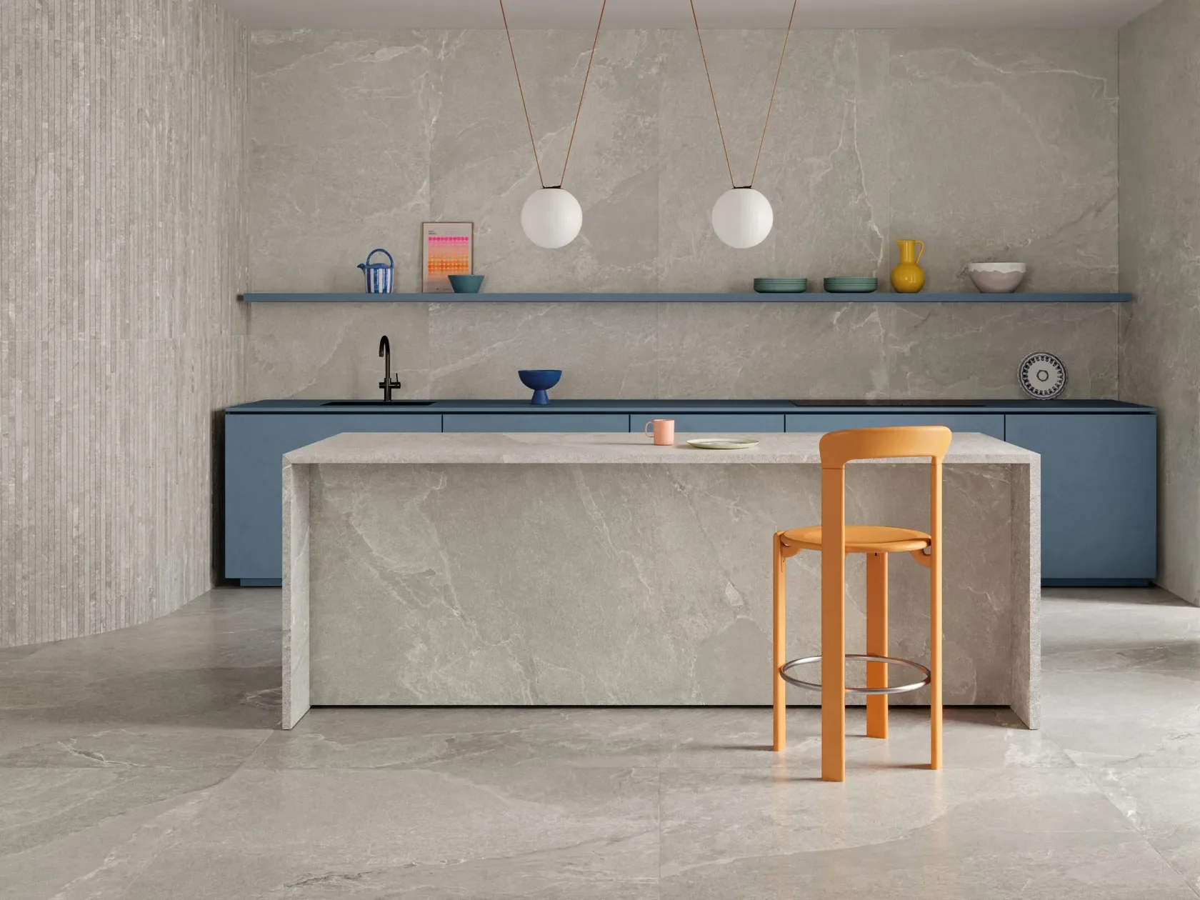 Contemporary minimalist kitchen featuring the Impronta Ardesia collection by the Italgraniti Group, highlighting stone-effect porcelain stoneware surfaces, expertly supplied by PietraCasa.