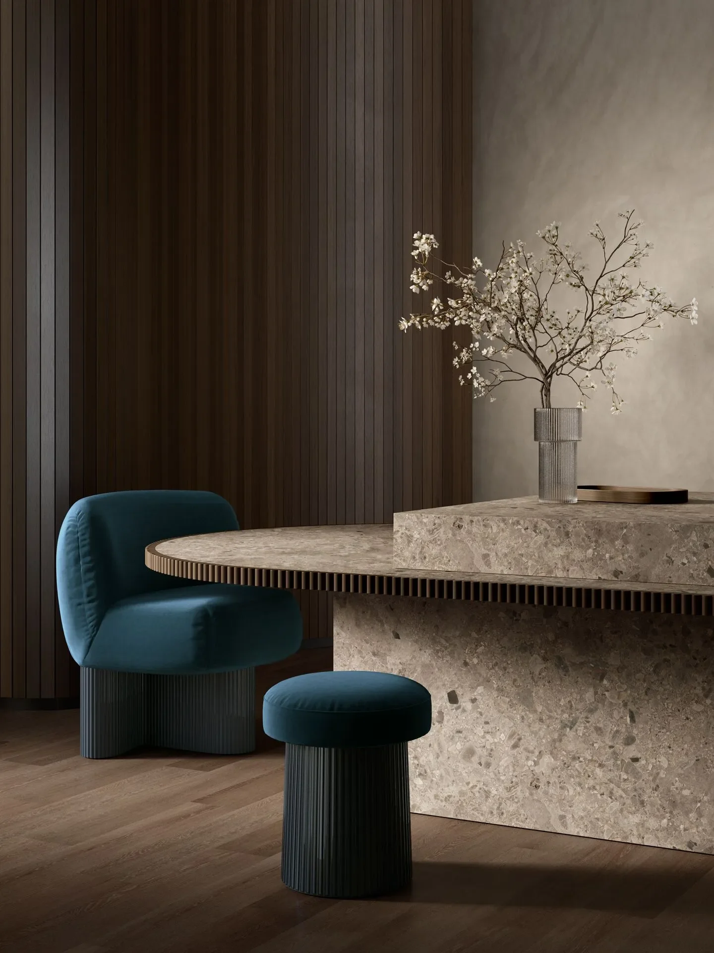 Custom contemporary luxury furniture featuring a table and bench constructed from Ceppo Varese by Sapienstone, paired with vibrant blue velvet-upholstered designer chairs, supplied by PietraCasa