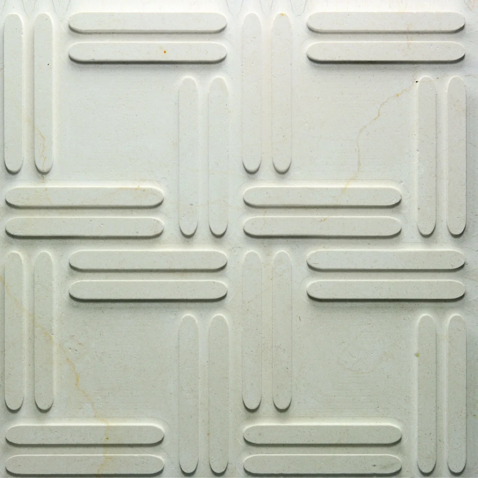 The Weave wall and floor covering designed by Raffaello Galiotto for Kreoo, featuring a sophisticated geometric textured stone pattern, supplied by PietraCasa.