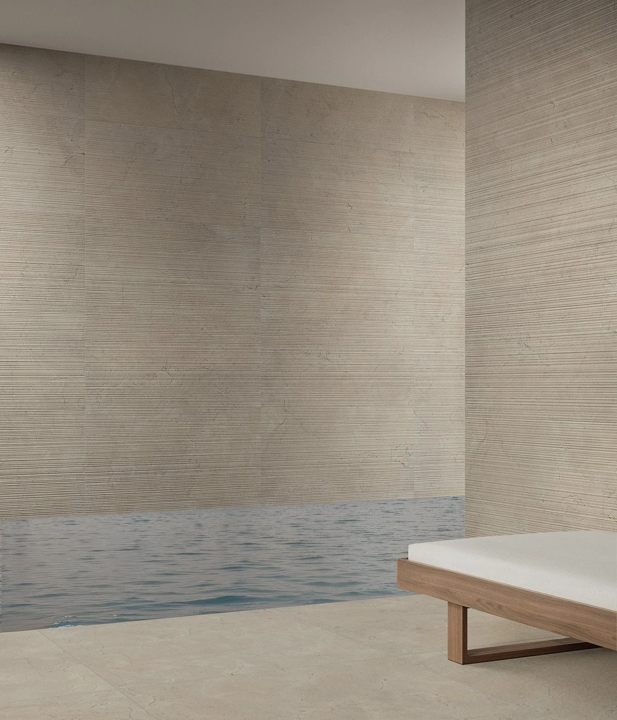 Tranquil interior featuring the Italgraniti Calcis porcelain stoneware collection in the Corda color, showcasing textured 3D Stripe Décor wall tiles and smooth, stone-effect base floor tiles, available through PietraCasa.