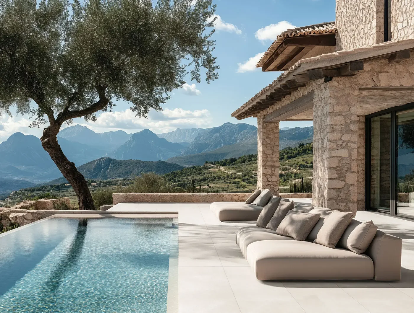 Modern Mediterranean patio featuring premium porcelain surfaces from the Terratinta Group, creating a seamless outdoor living space, supplied by PietraCasa.