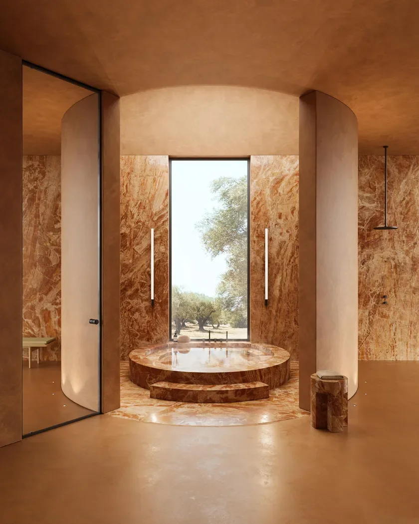 Luxurious spa-like bathroom clad in Breccia Bohemien Italian marble, featuring a sunken circular bathtub and olive grove views, supplied by PietraCasa.