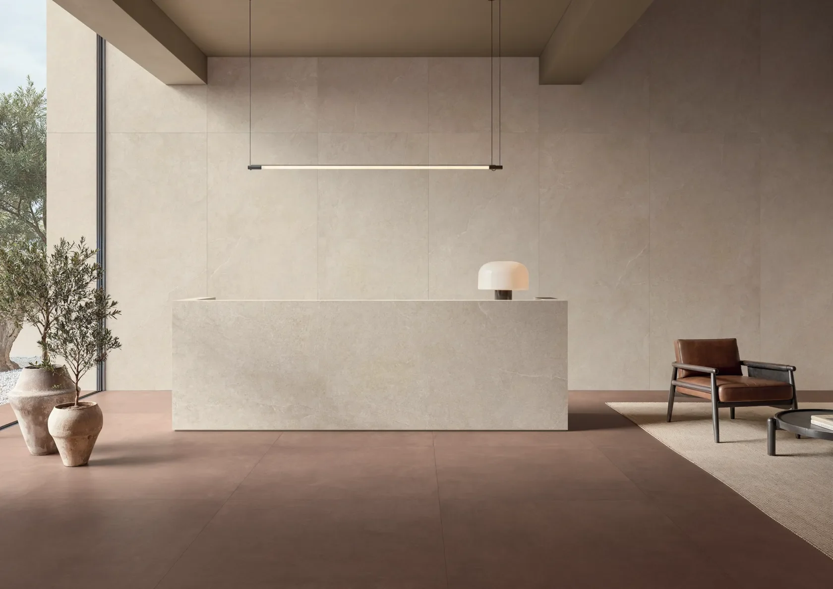 Sophisticated commercial interior featuring versatile surfaces from the Concrete collection by Impronta, part of the Italgraniti Group, supplied by PietraCasa.